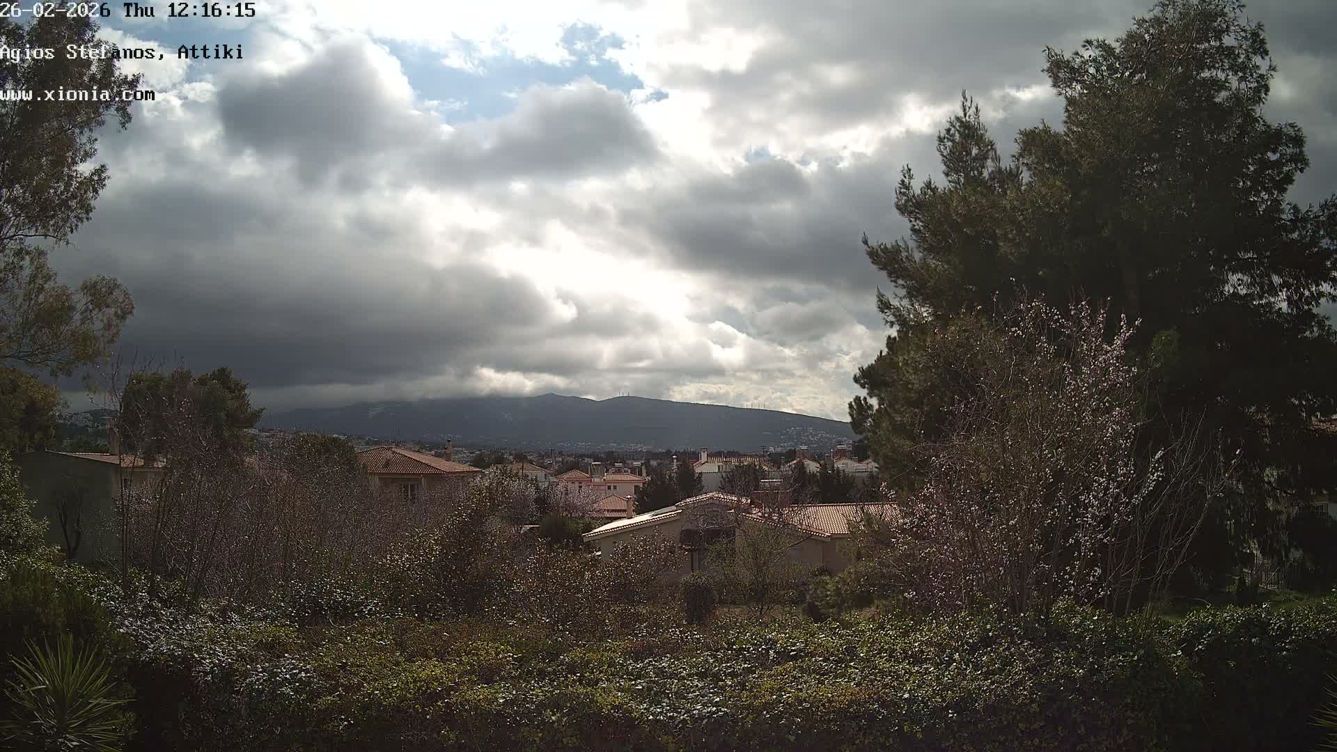 Dionysos, Agios Stefanos Skyline & Mount Pentelicus (Pentéli Óros) Live Cam  - Dasos Kouremenou, Ágios Stéfanos, Diónysos, East Attica (Anatolikís Attikís) , Athens (Athína), Attica (Attikí), Greece