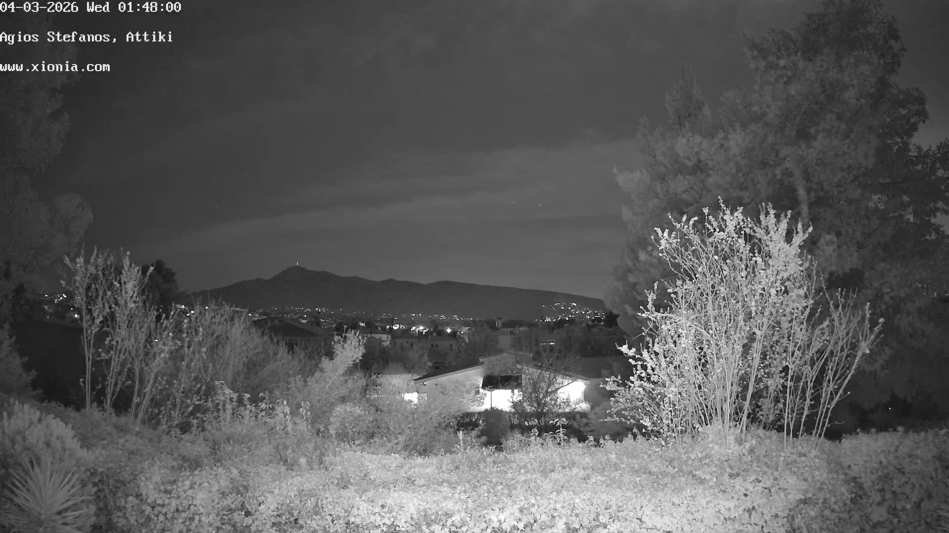 Dionysos, Agios Stefanos Skyline & Mount Pentelicus (Pentéli Óros) Live Cam  - Dasos Kouremenou, Ágios Stéfanos, Diónysos, East Attica (Anatolikís Attikís) , Athens (Athína), Attica (Attikí), Greece