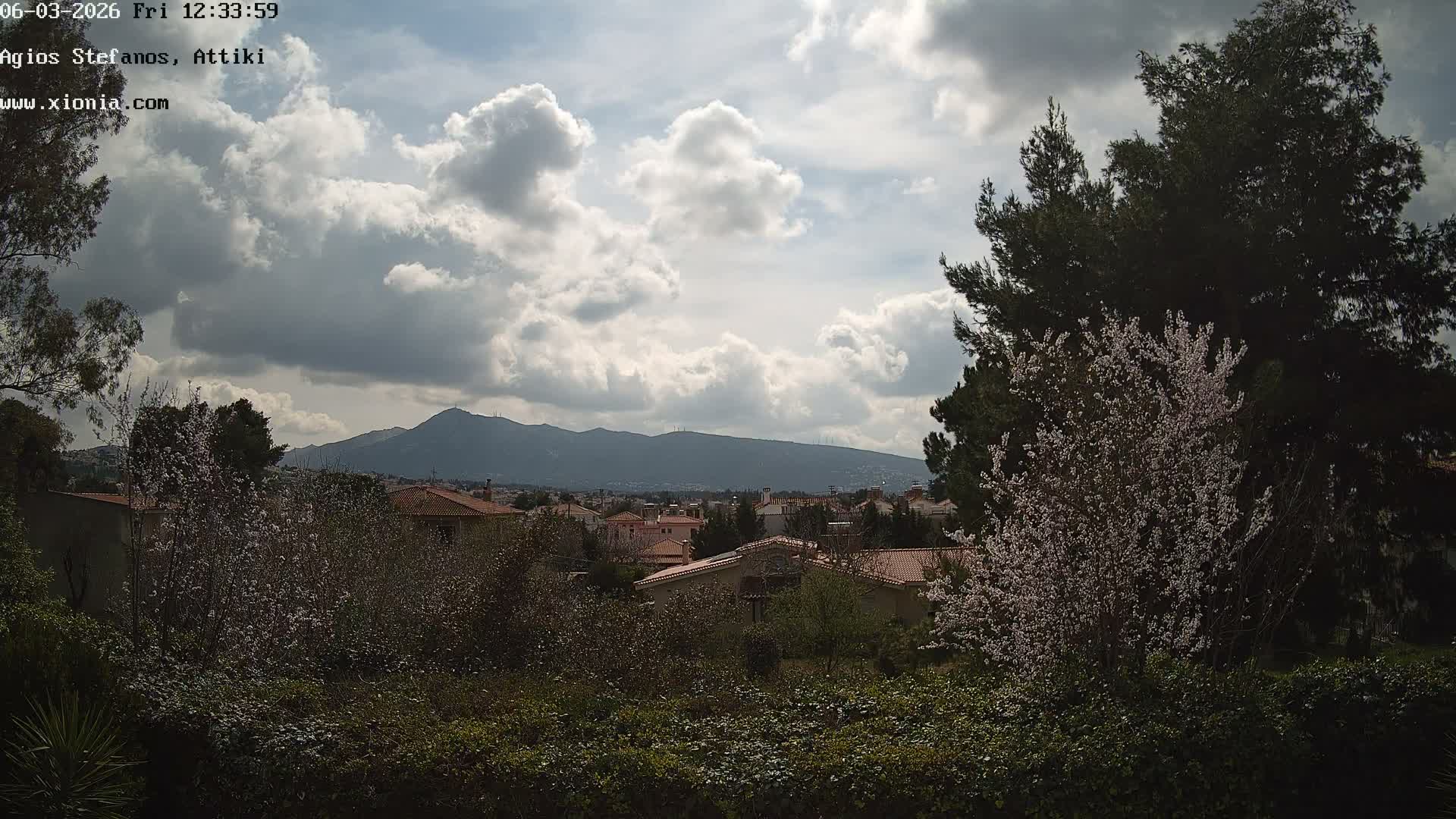 Dionysos, Agios Stefanos Skyline & Mount Pentelicus (Pentéli Óros) Live Cam  - Dasos Kouremenou, Ágios Stéfanos, Diónysos, East Attica (Anatolikís Attikís) , Athens (Athína), Attica (Attikí), Greece
