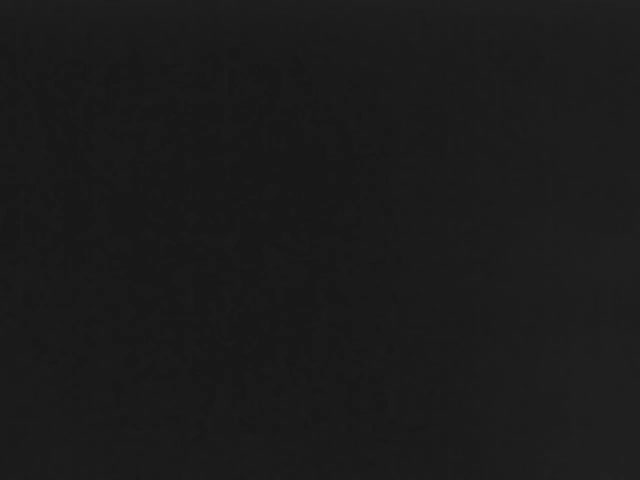 The image is entirely black with no discernible content.