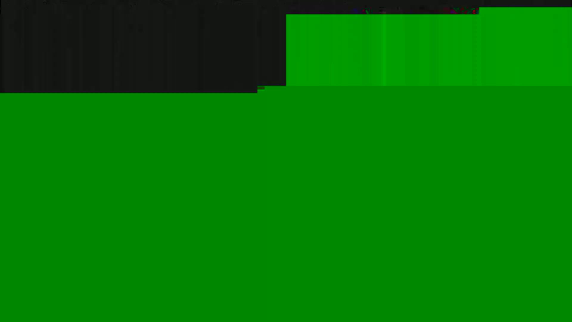 The image shows a mostly green screen with a smaller dark grey area at the top.