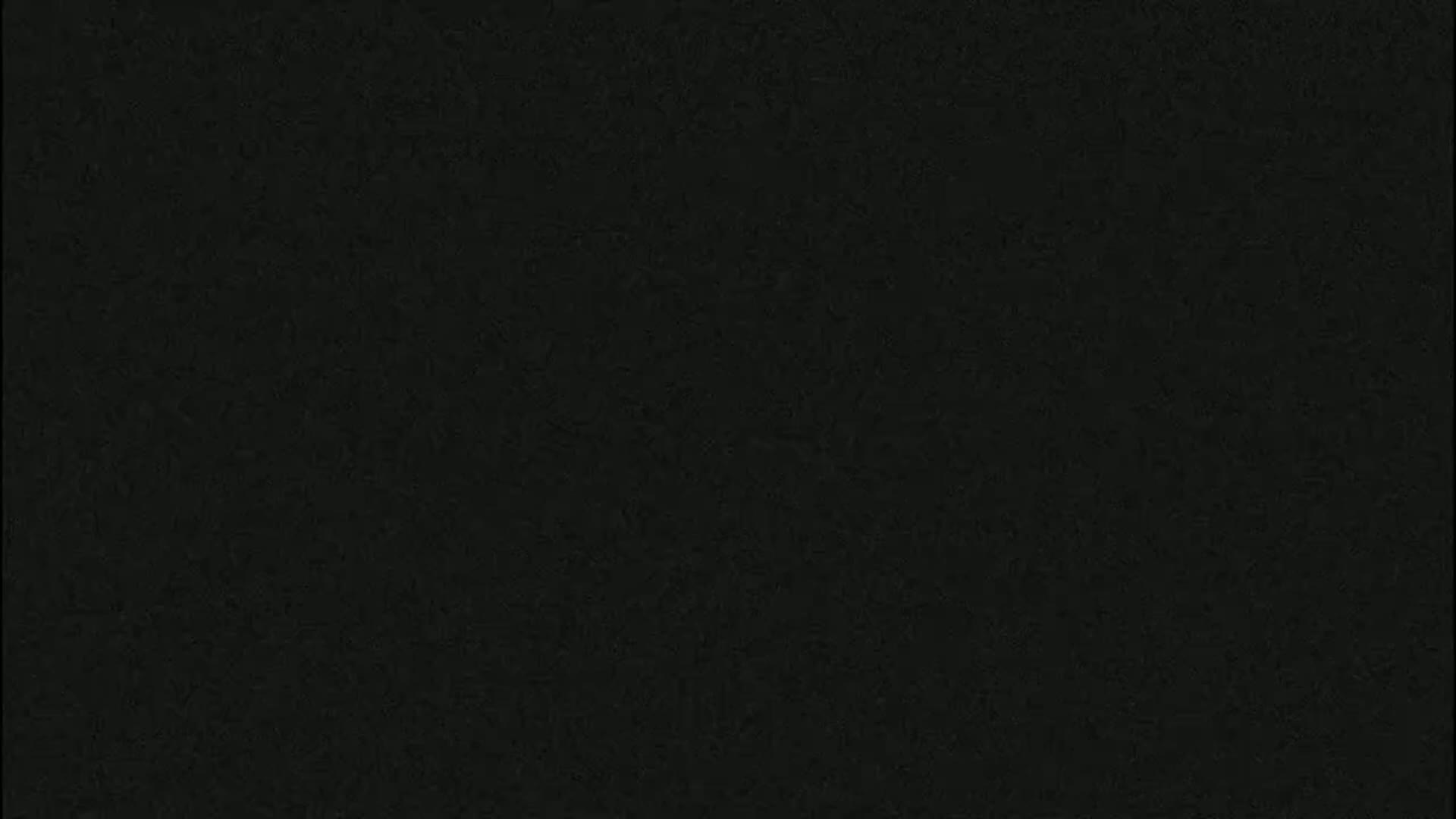 The image is a solid dark gray or black.