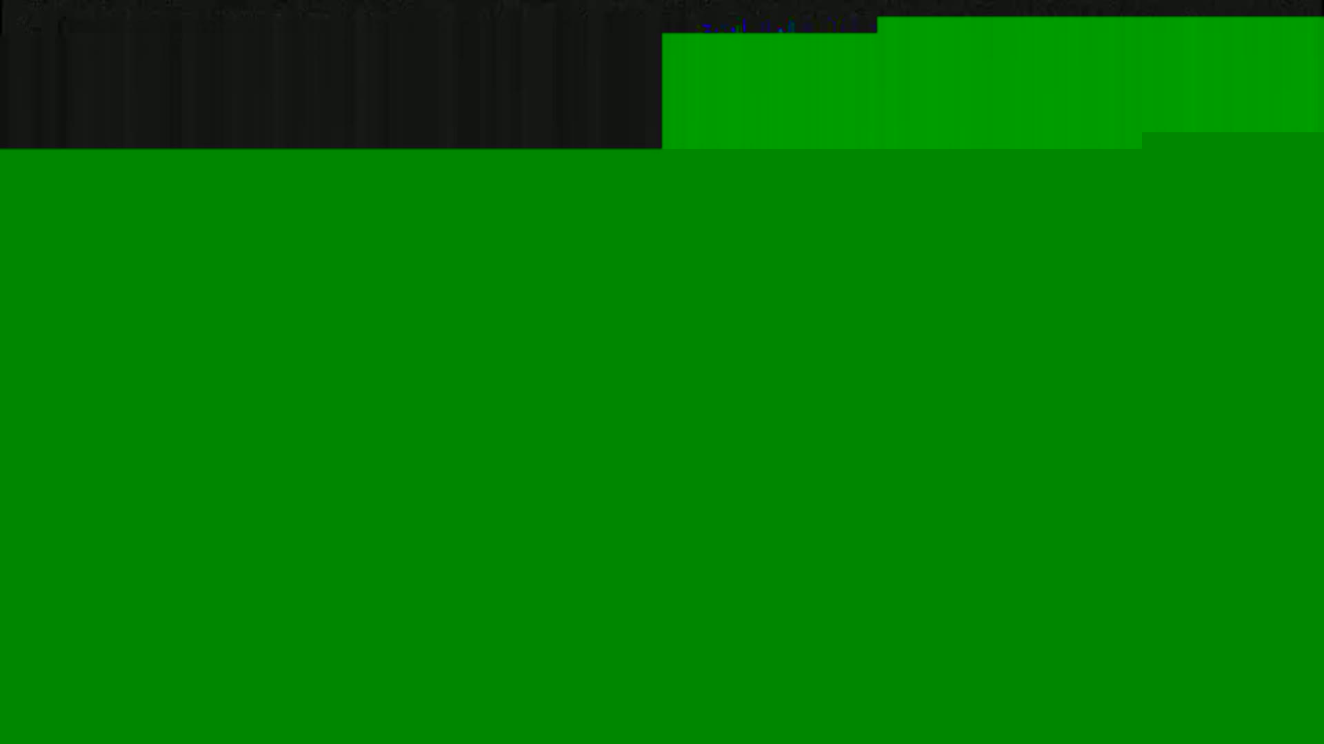 The image shows a mostly solid green field with a thin black band at the top.