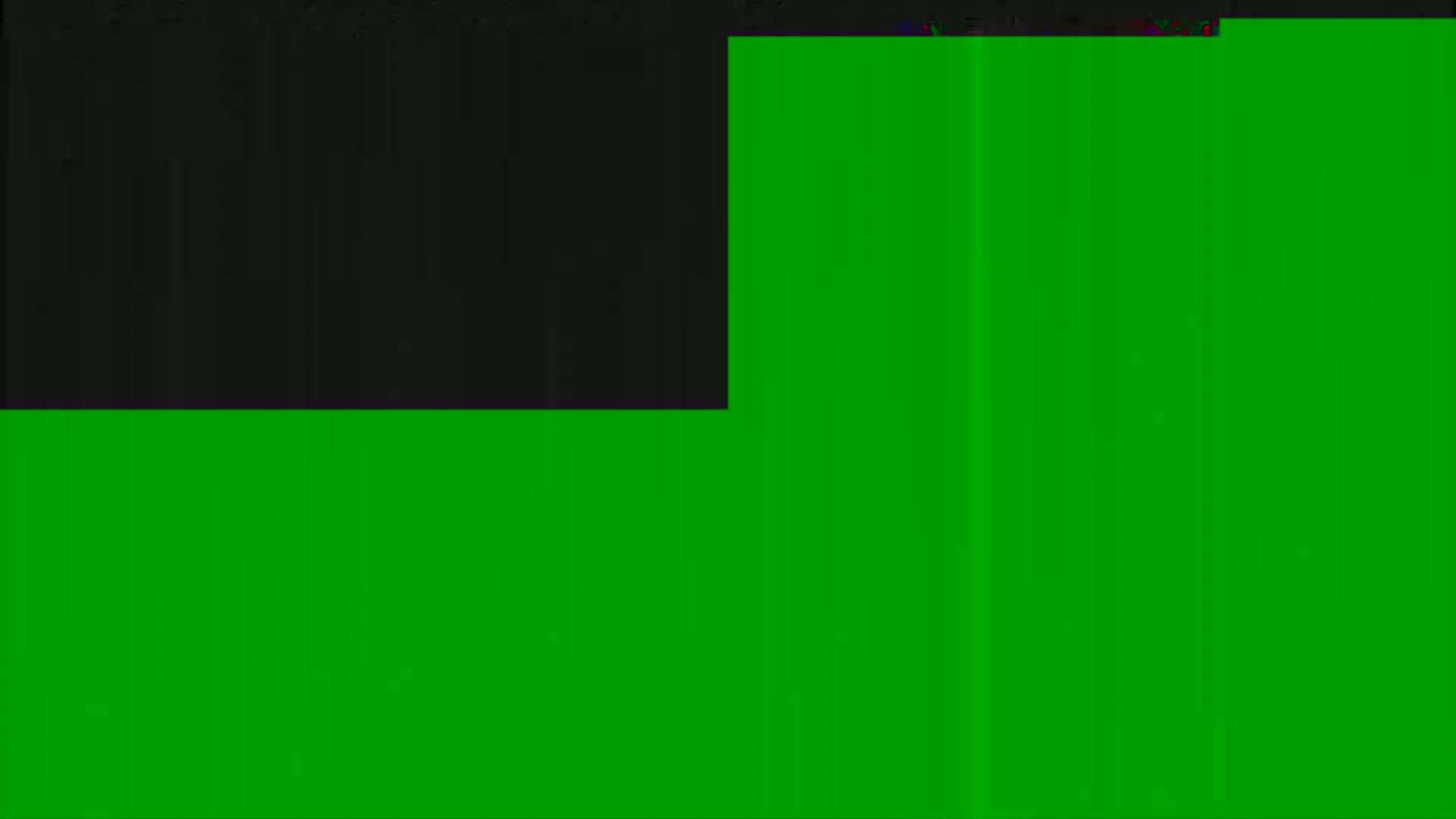 The image shows a mostly green surface with a smaller black section at the top left.