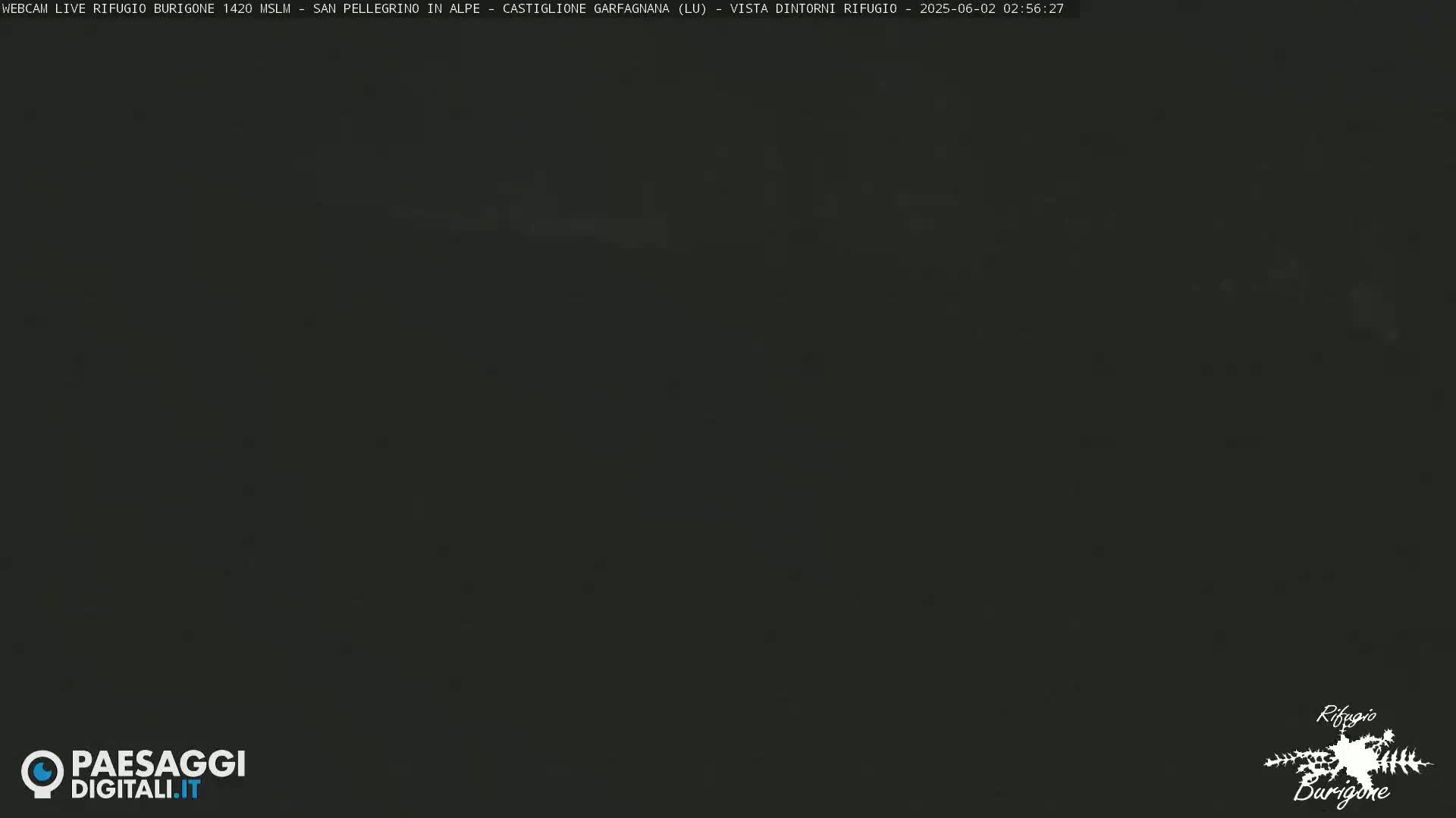A completely dark image, likely taken at night outdoors.