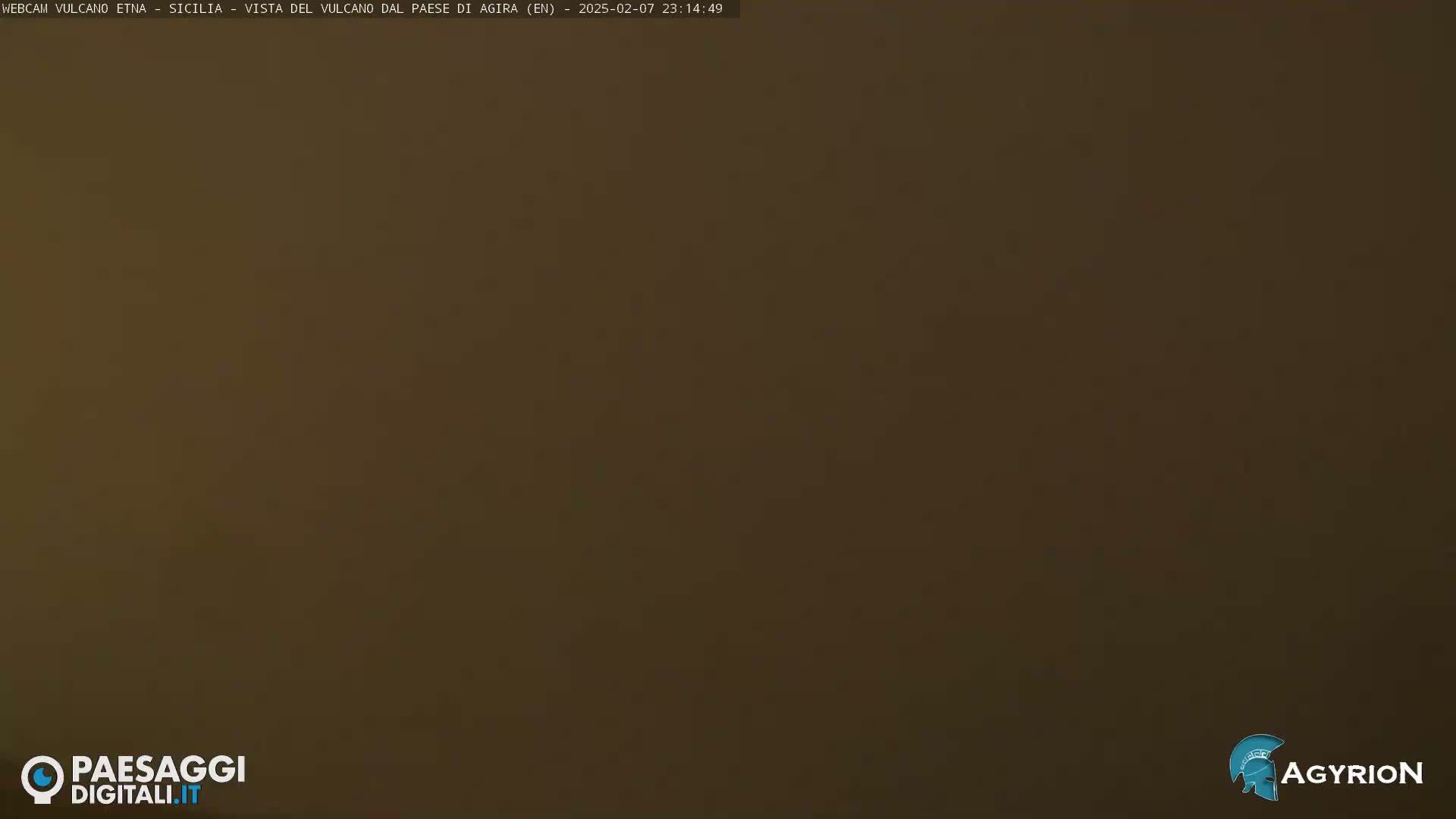 A uniformly dark brown field fills the entire image.