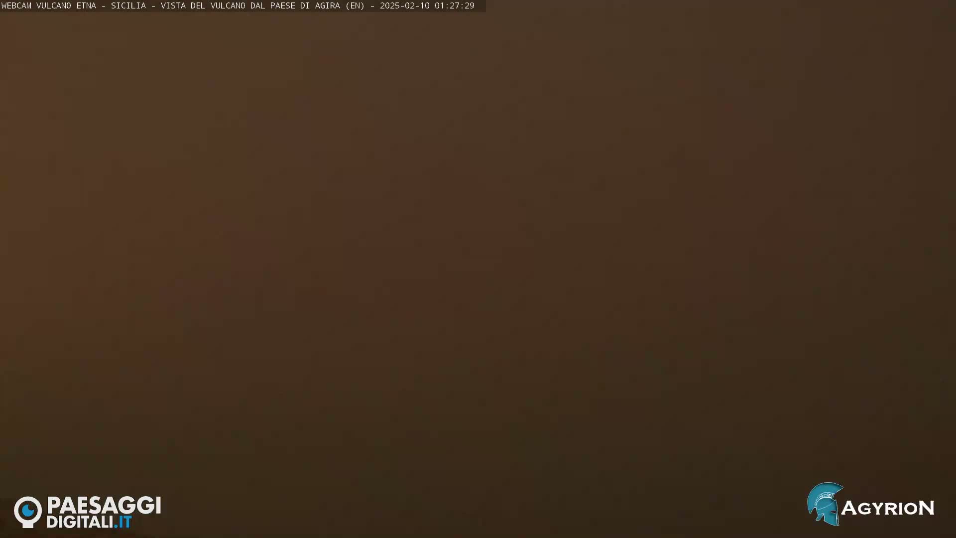 A uniformly dark brown image fills the frame.