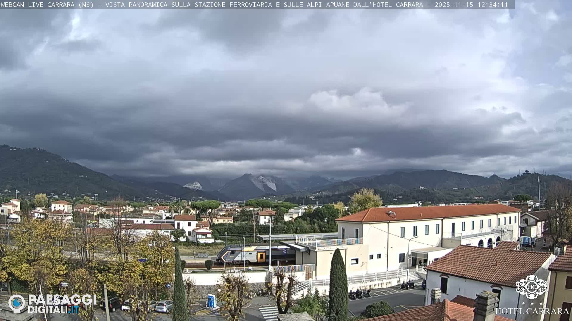  Carrara City Railway Station & Panaromic Natural Alps Park Live Cam - Massa & Carrara, Tuscany, Italy