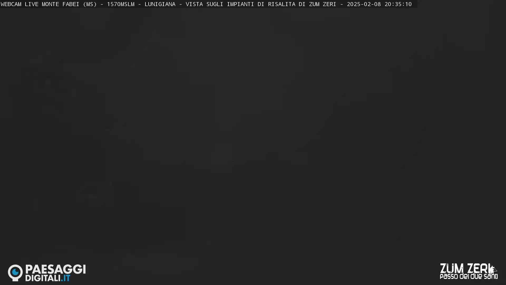 A dark, blurry image obscures any discernible features.