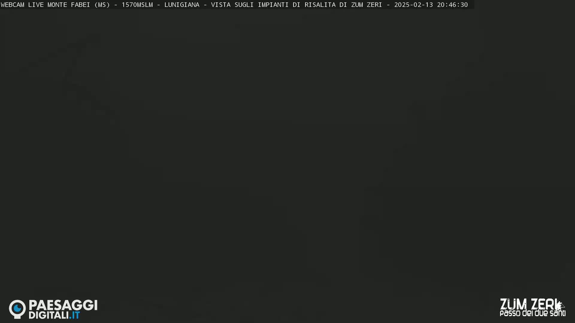 A dark, mostly featureless image, possibly taken at night.