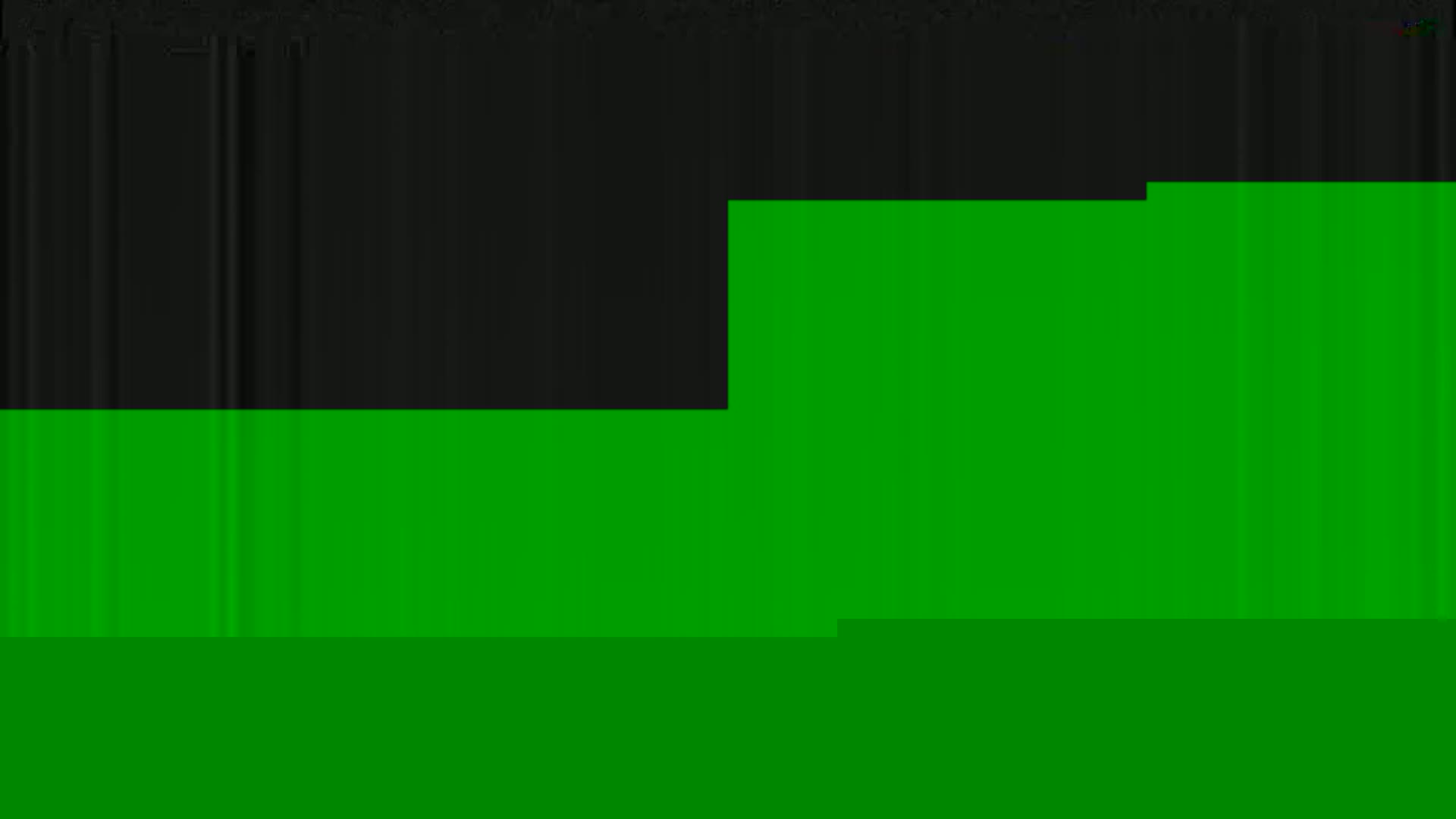 The image shows a mostly green background with a smaller, dark area at the top.