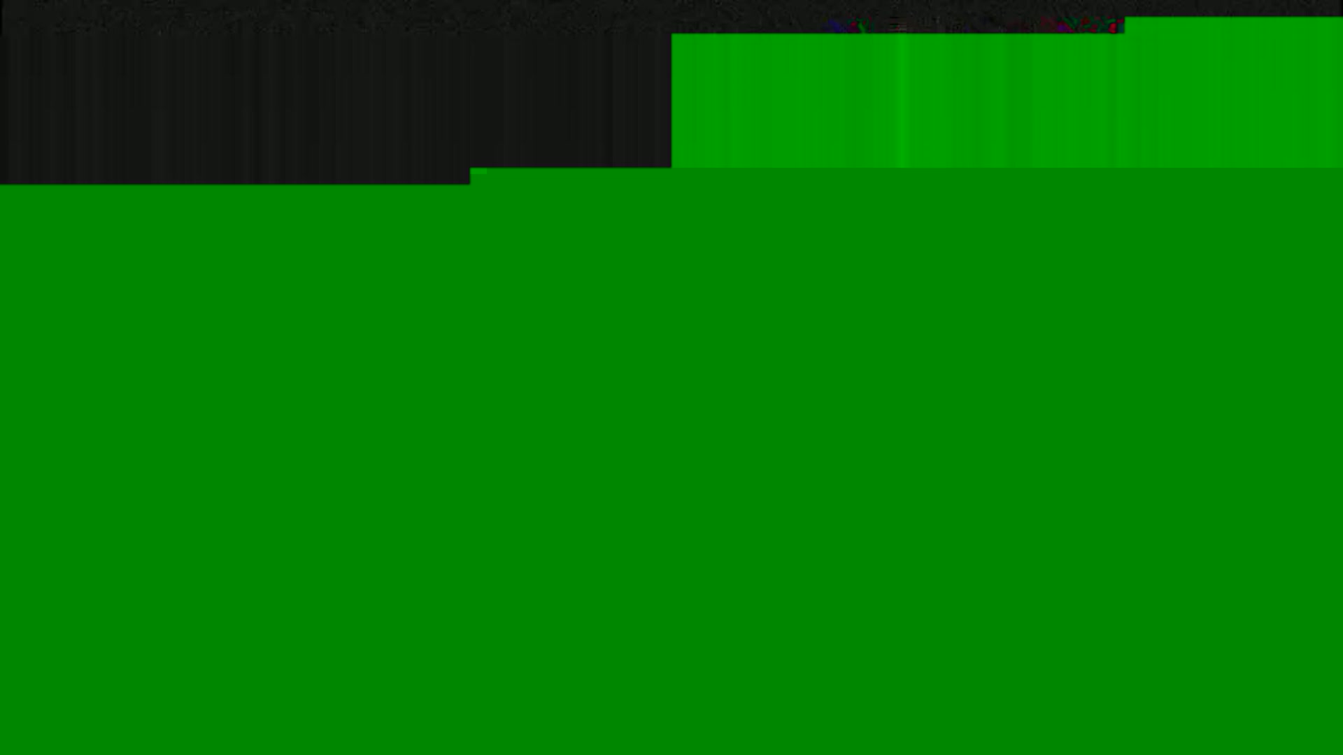 The image shows a mostly solid green background with a small section of dark gray at the top.