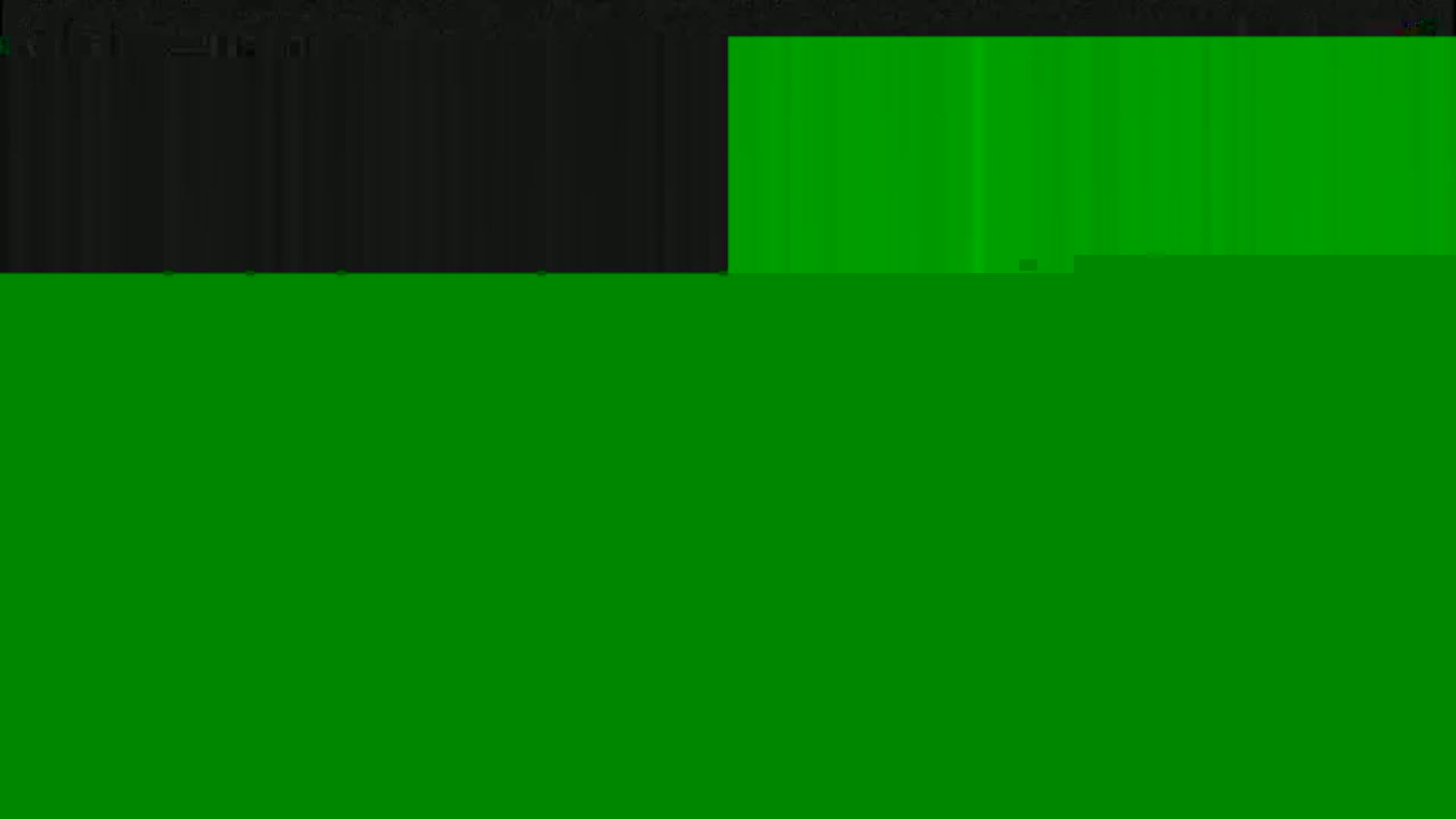 The image shows a mostly green screen with a smaller, dark gray area at the top.