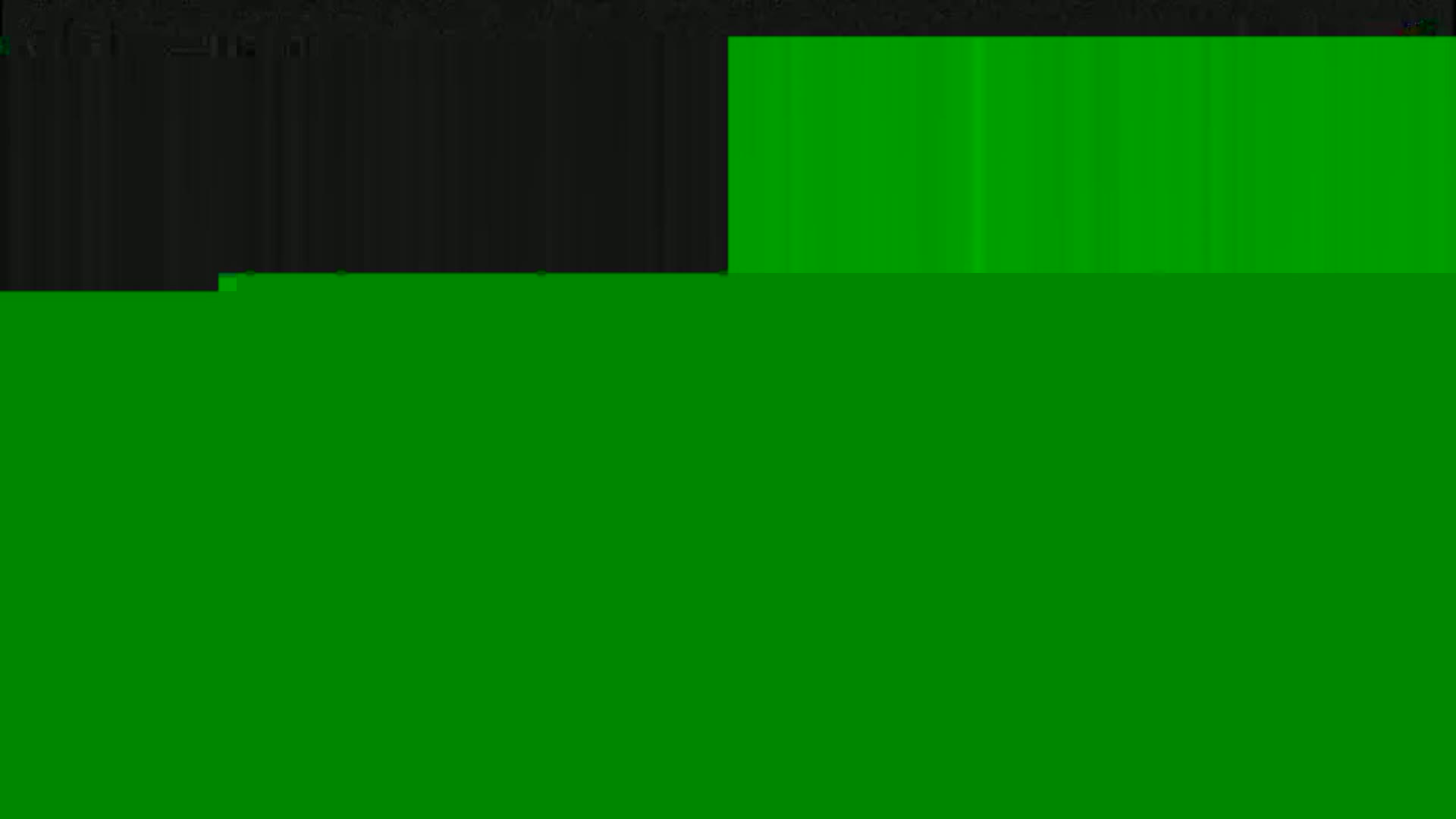 The image shows a mostly green screen with a small section of dark gray at the top.