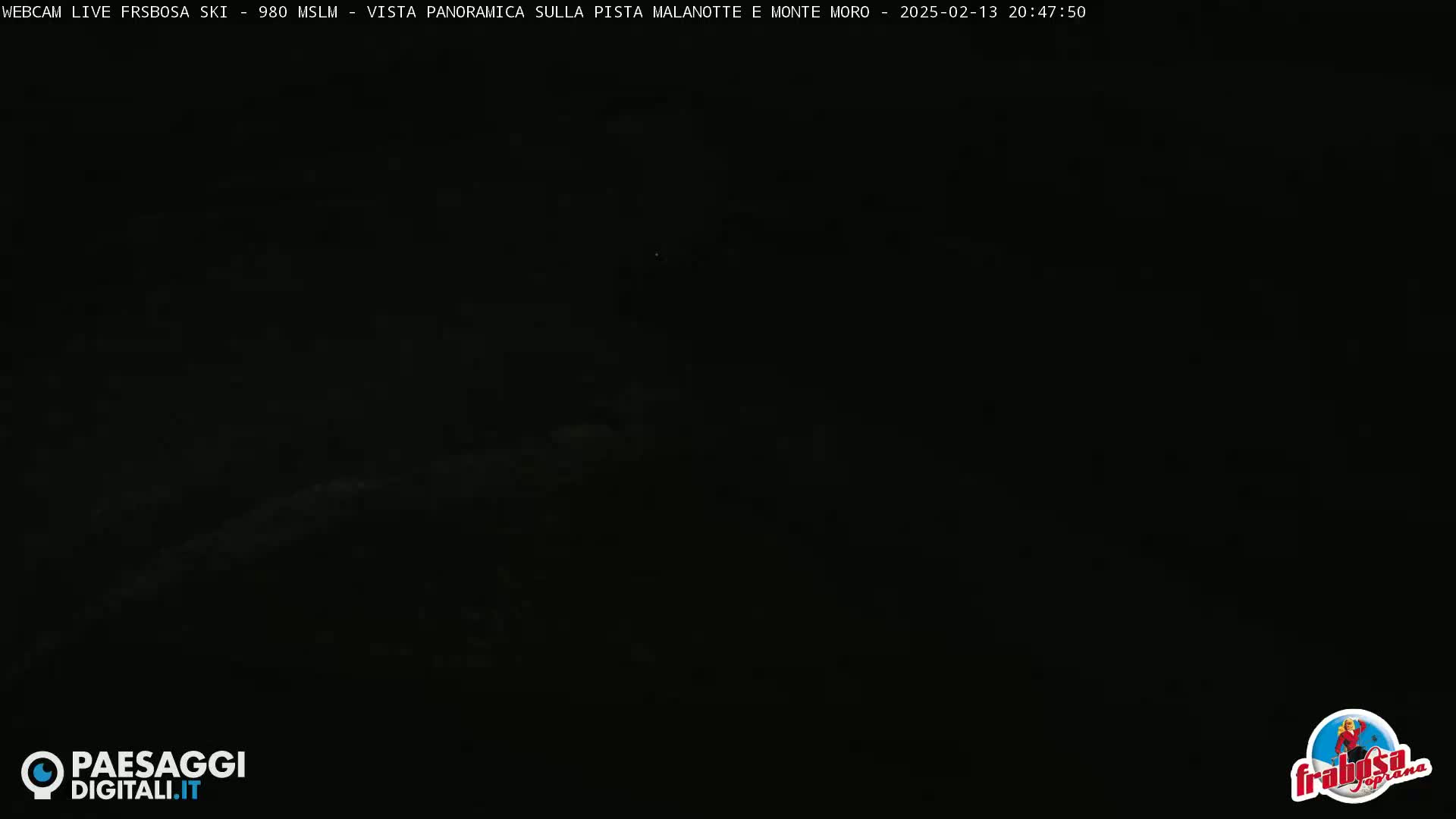 A dark, nighttime scene is visible, likely outdoors.