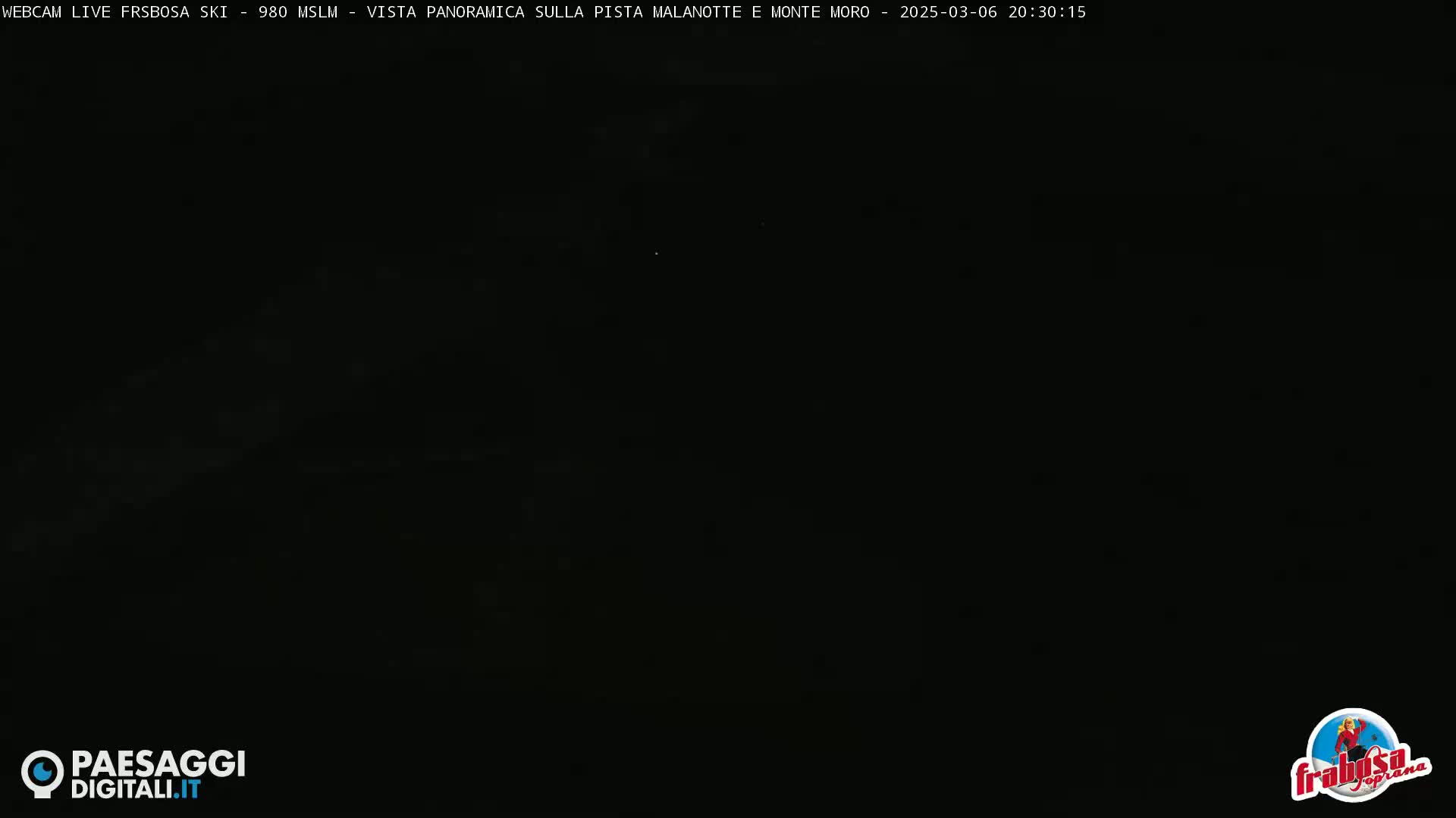 A completely dark image is shown, possibly taken at night outdoors.
