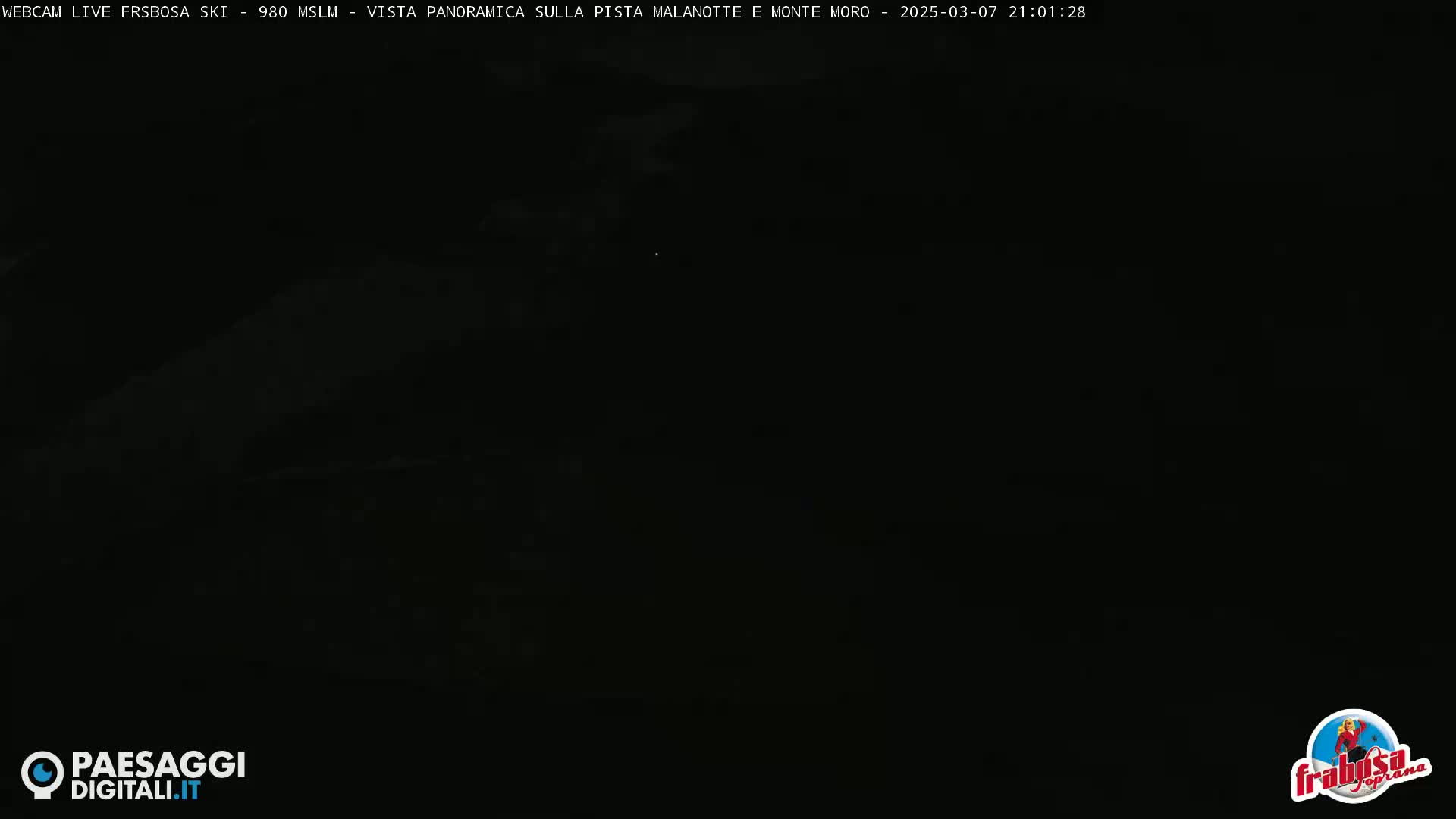 A completely dark, nighttime image of a mountain slope.