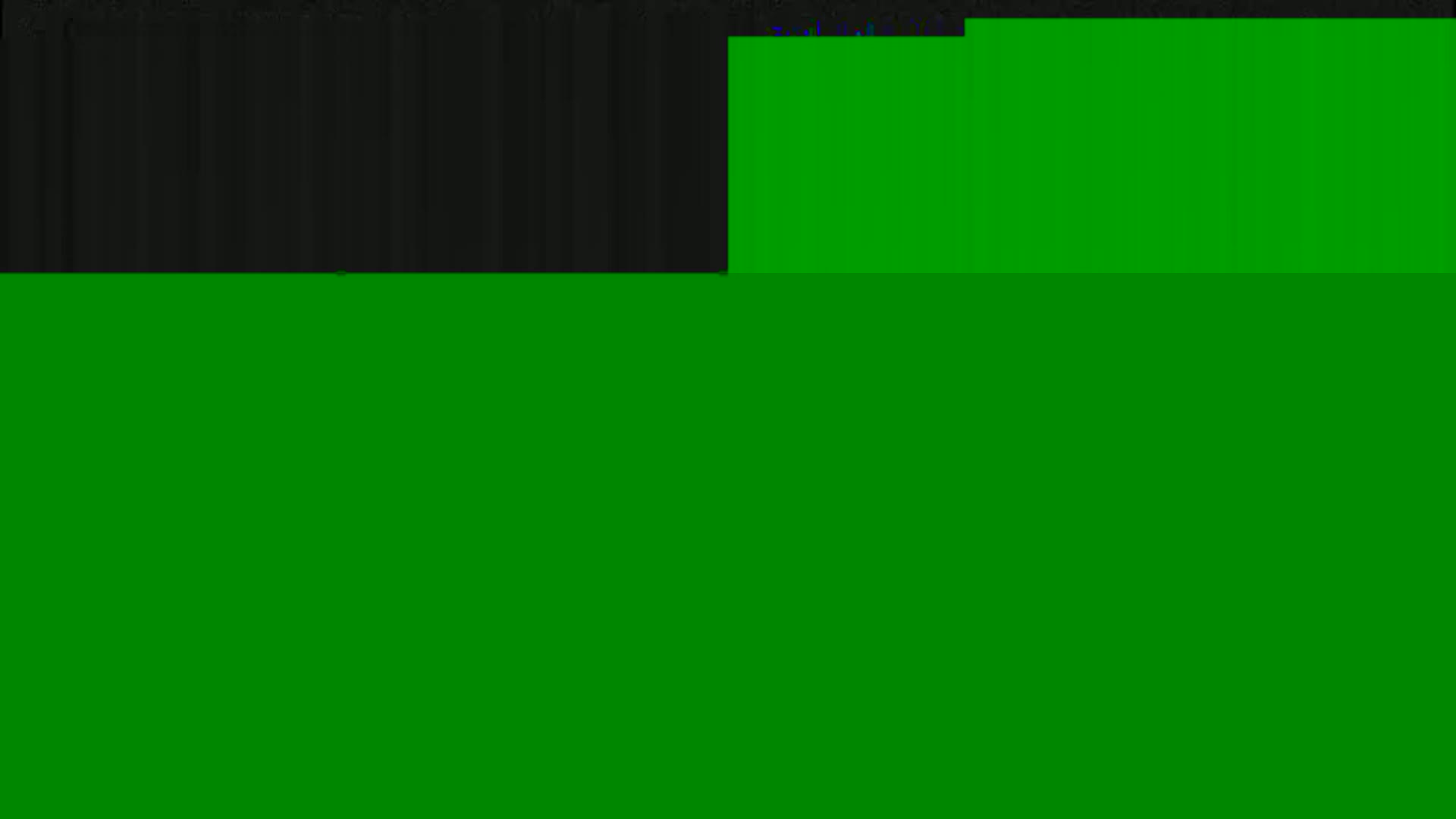 The image shows a mostly green surface with a dark gray section at the top.