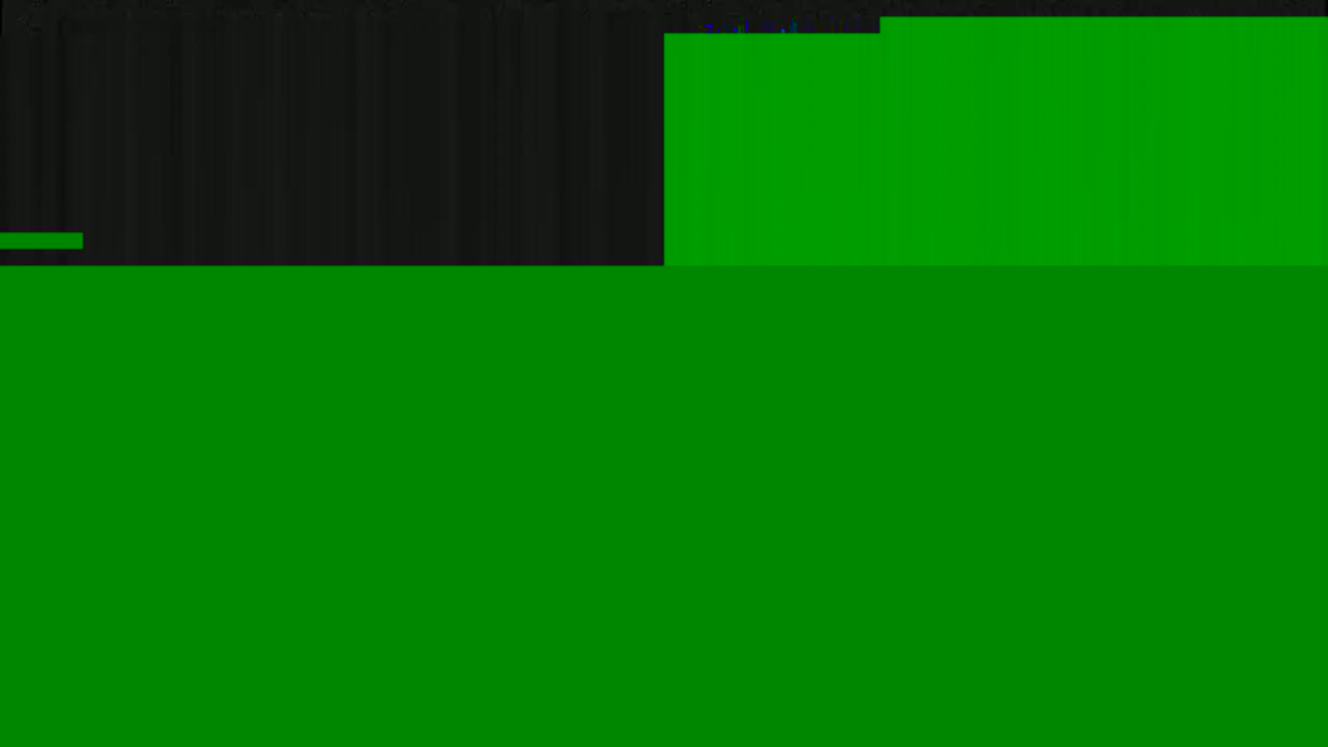 The image shows a mostly green screen with a smaller, dark gray area at the top.
