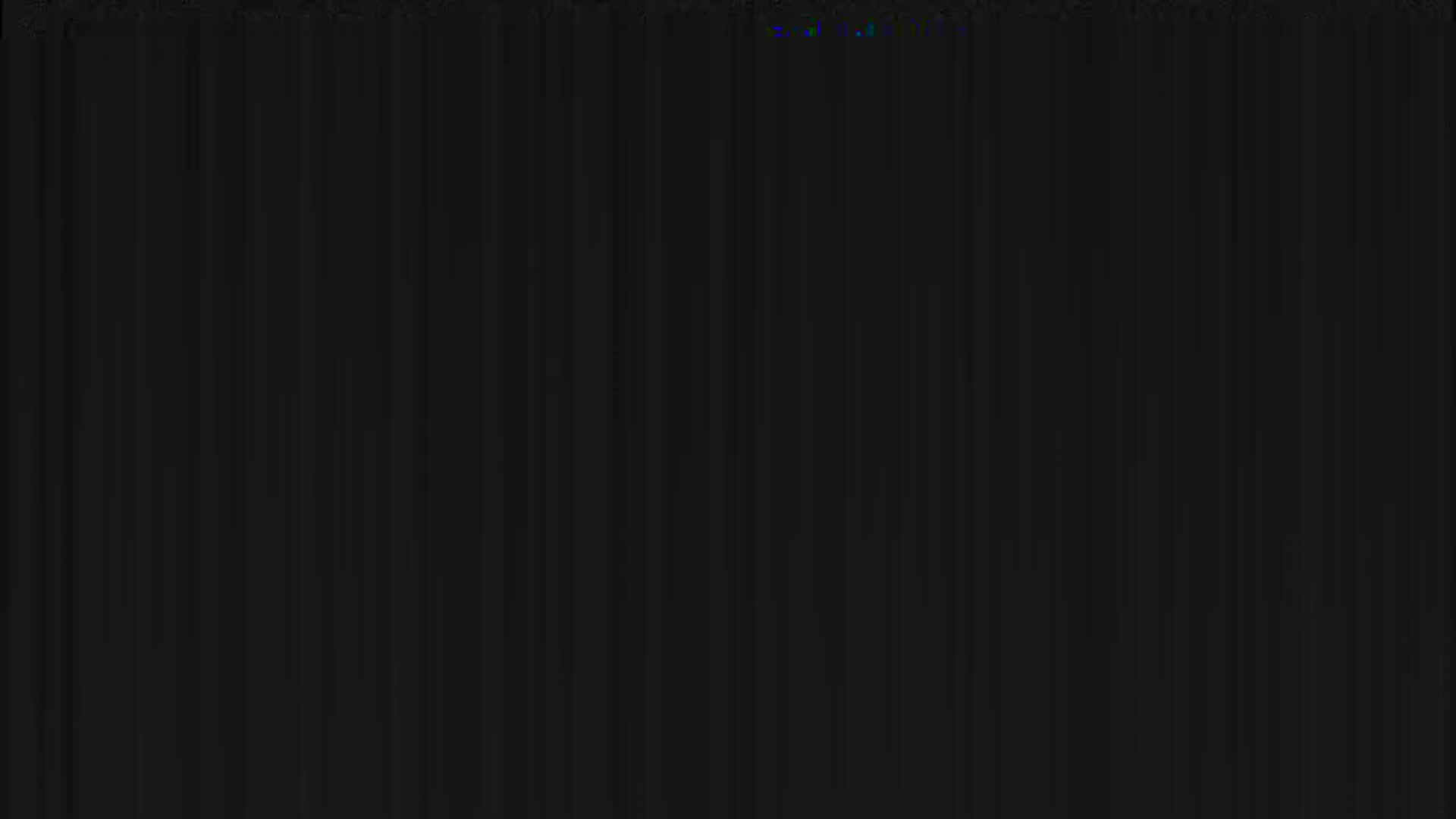 The image shows a uniformly dark gray or black background with subtle vertical lines.