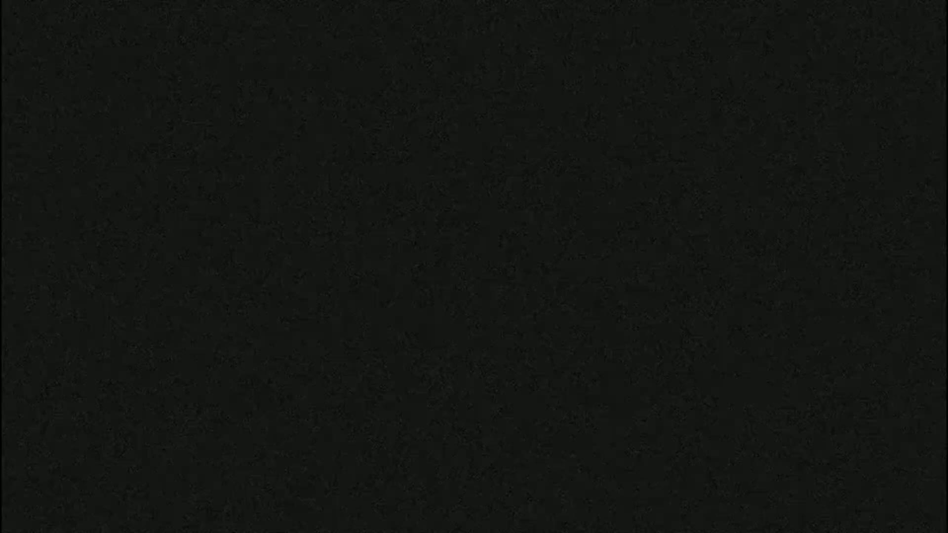 The image is a solid dark-grey/black color.