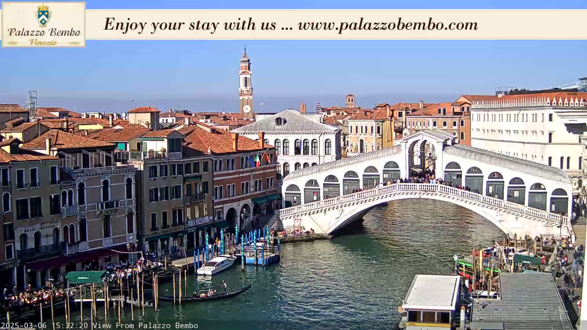 A sunny day in Venice shows a canal with gondolas and boats, and the Ponte dei Sospiri (Bridge of Sighs) spanned with people.