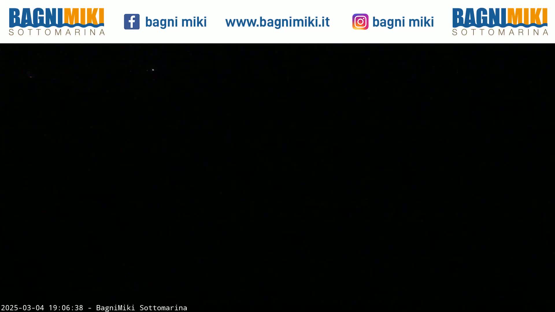 The image shows a completely dark scene at night.