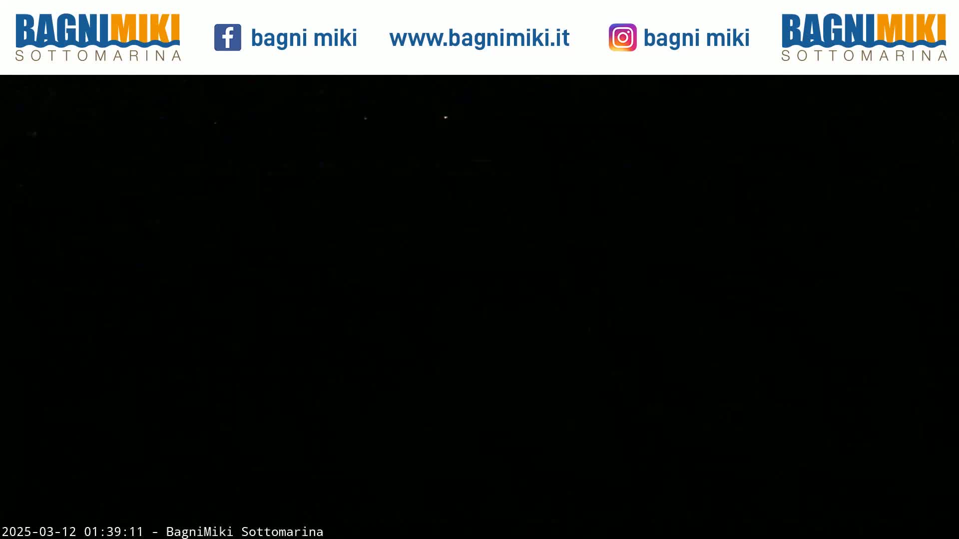 A completely dark nighttime scene is visible.