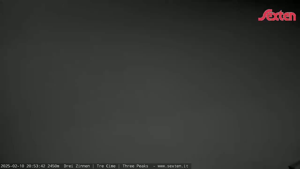 A dark gray, overcast sky fills the entire frame.