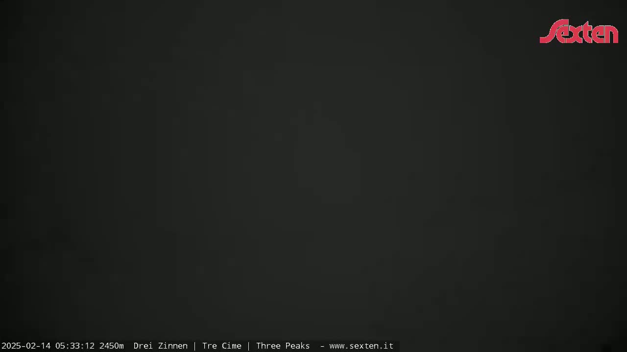The image shows a completely dark, solid-colored scene.