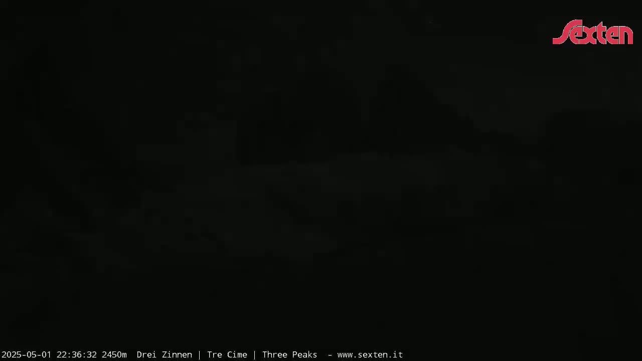 The image is almost entirely black, suggesting nighttime conditions.