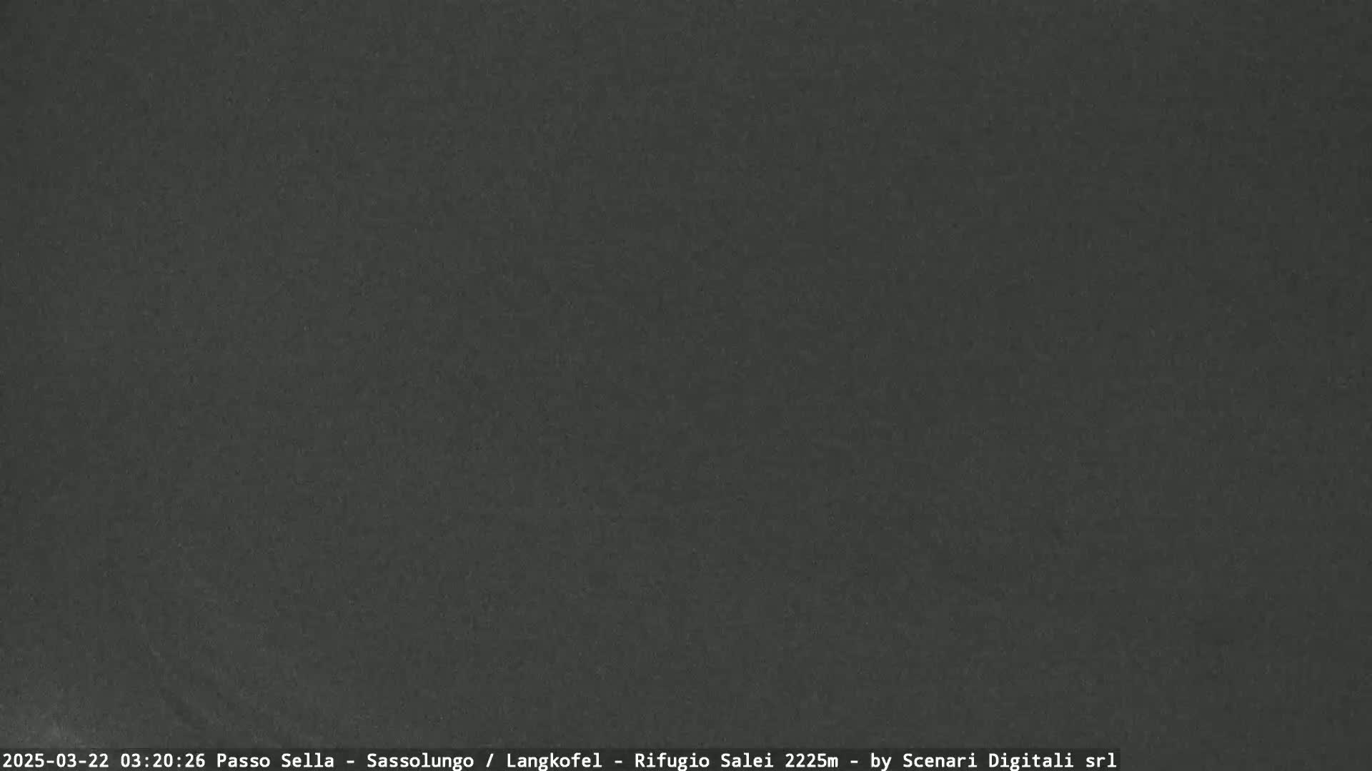 A dark gray, uniformly textured surface fills the entire image.