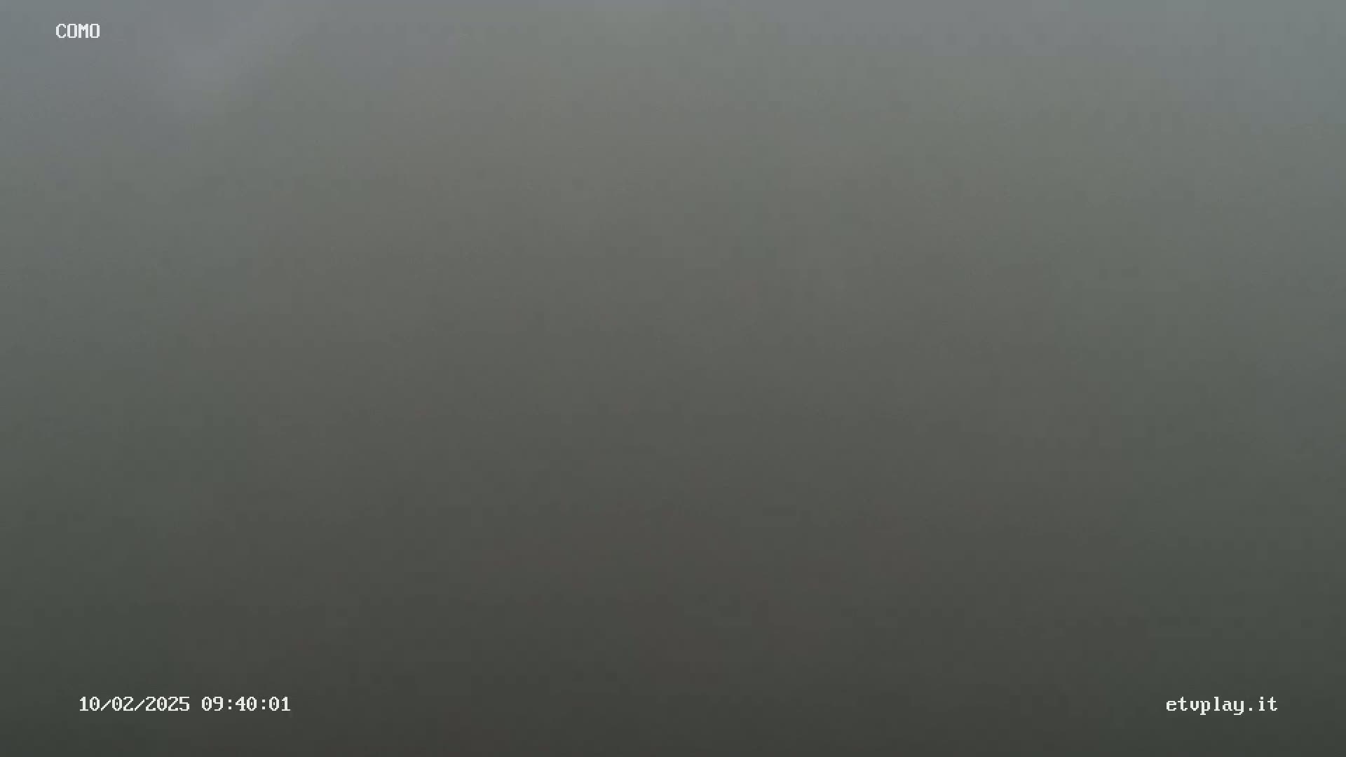 A gray, foggy scene is visible.