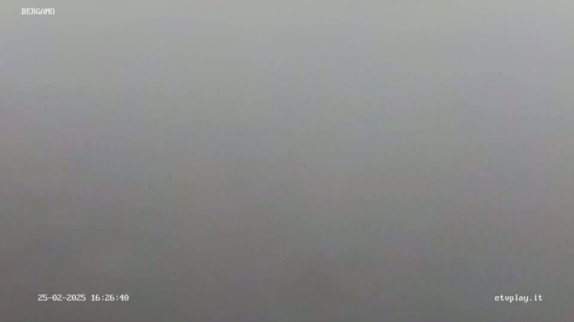 A thick fog obscures the view.