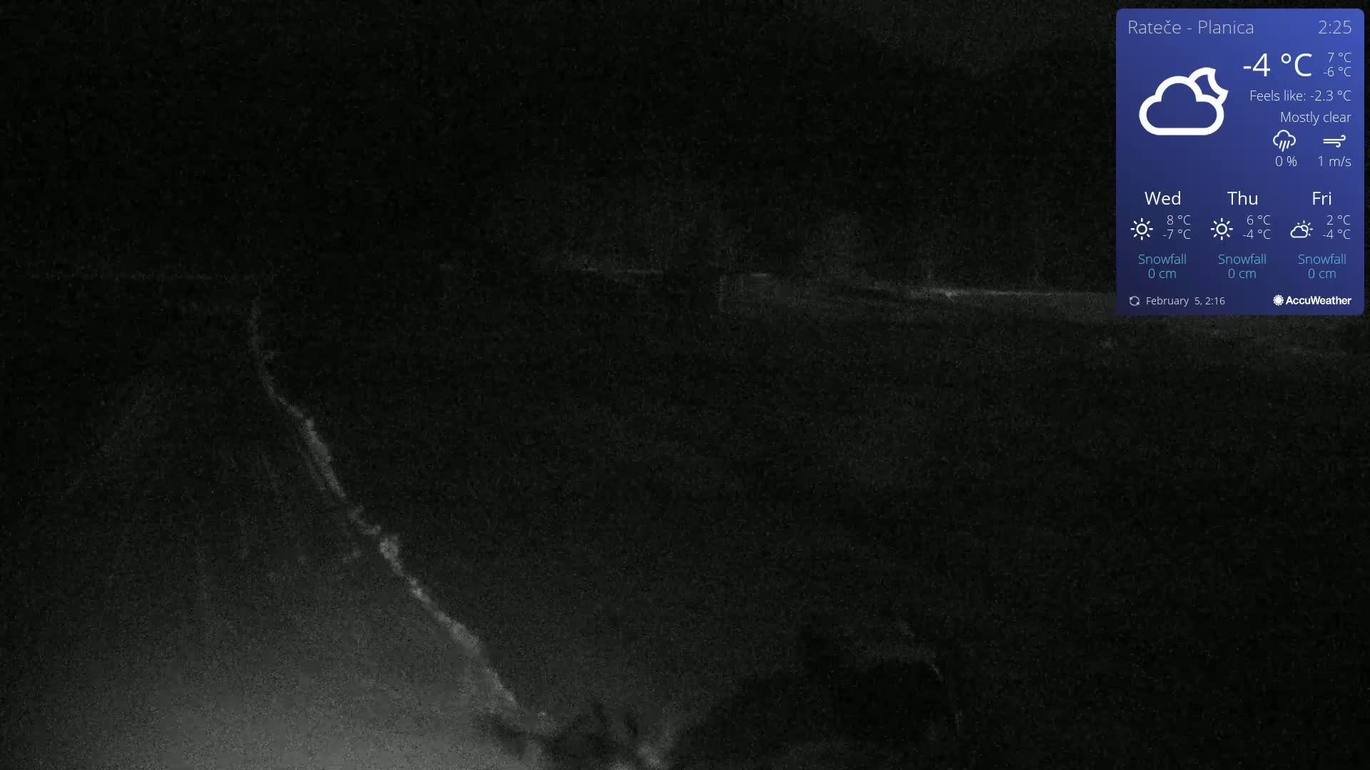 A mostly clear night scene shows a dark, snow-covered landscape under a -4°C temperature.