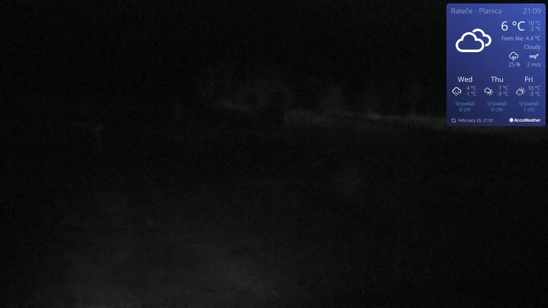 A dark, cloudy night scene with a hint of light in the distance.