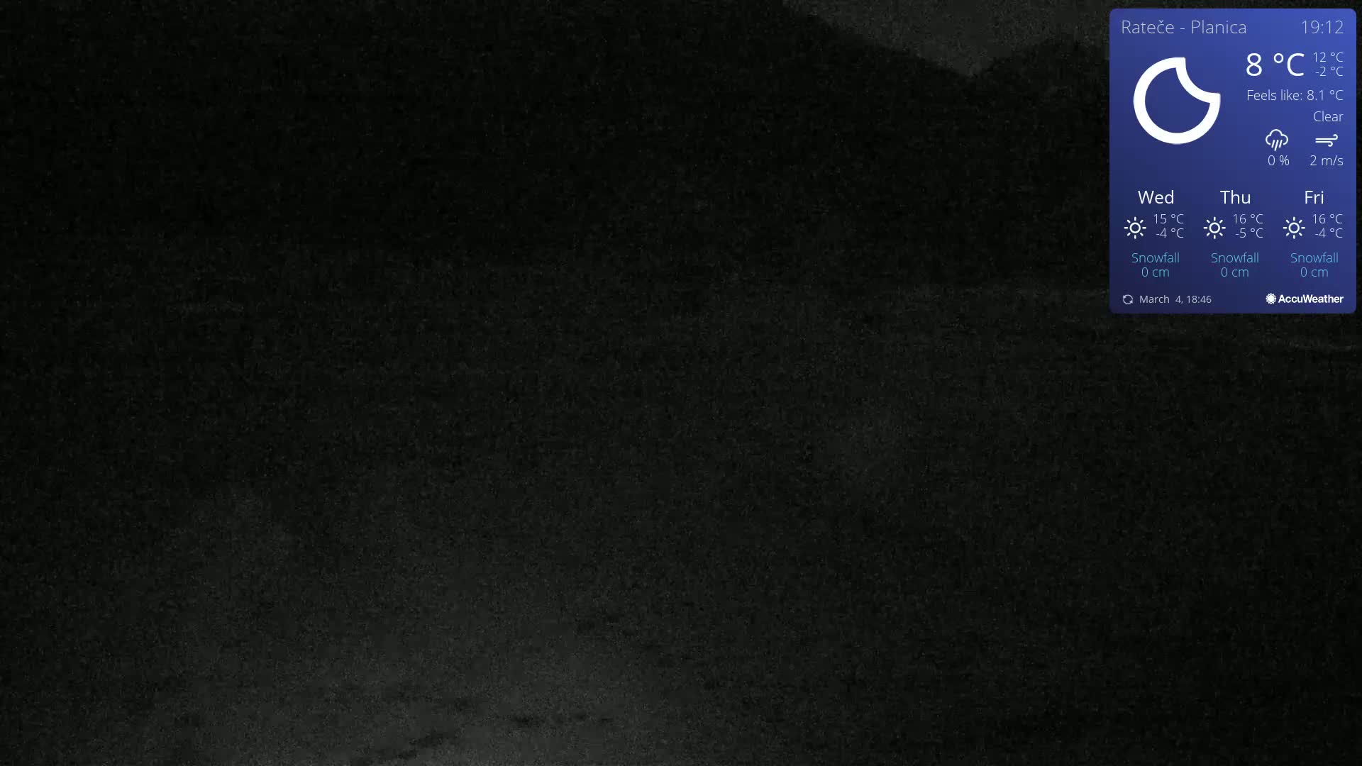 A dark, nighttime outdoor scene with clear skies.
