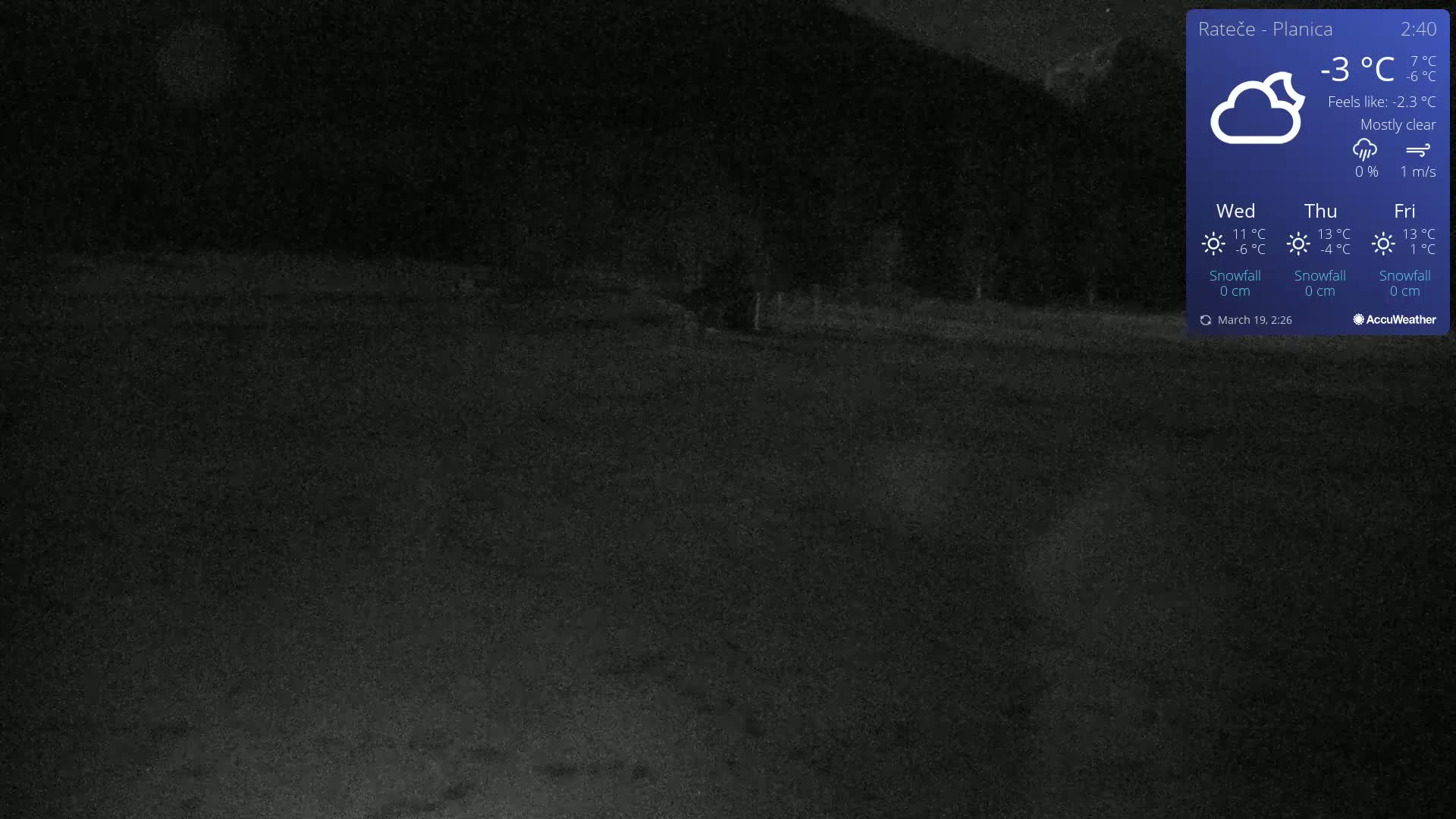 A mostly clear night scene shows a dark, flat expanse of land under a -3°C temperature.