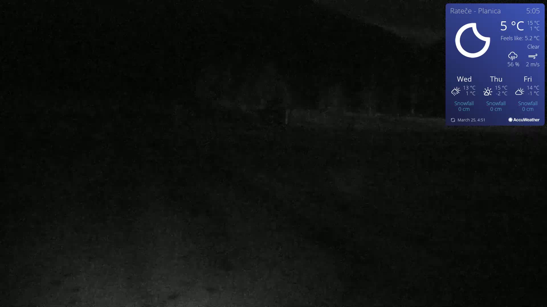 A dark, nighttime scene shows a mostly featureless expanse of land under a clear sky.