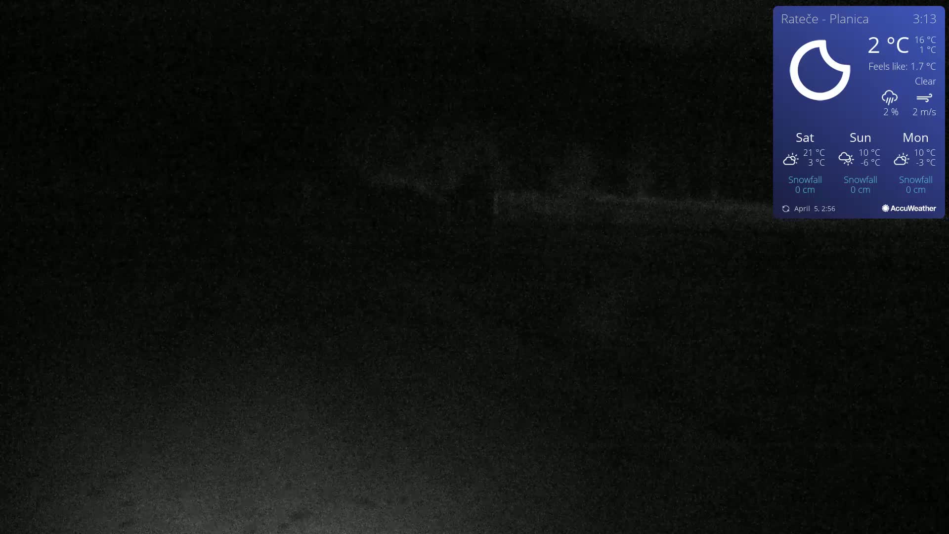 A dark, nighttime image shows a clear sky with a faint, light source near the bottom.