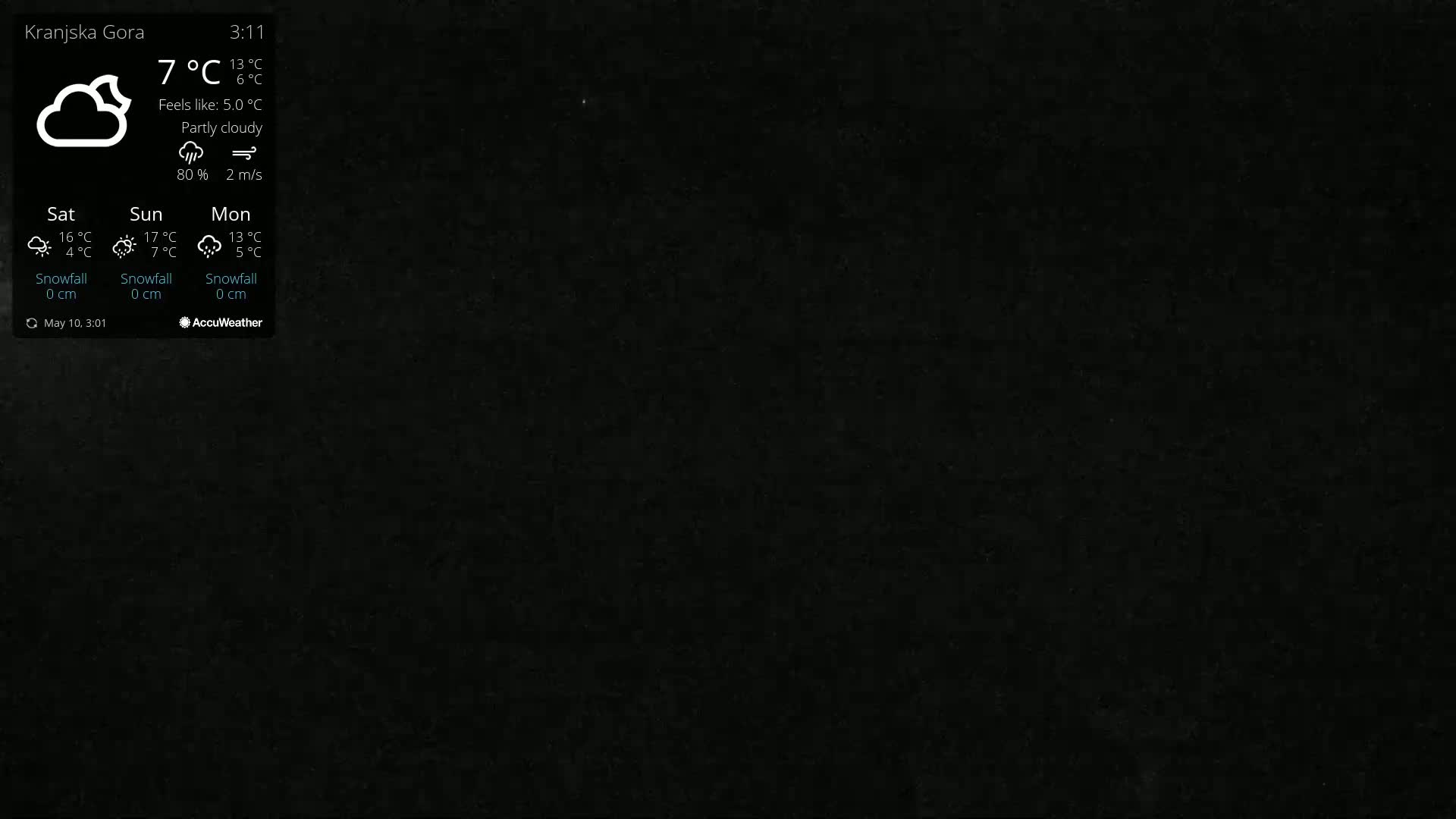 A dark, partly cloudy scene is shown with a weather widget displaying a temperature of 7°C and a wind speed of 2 m/s.