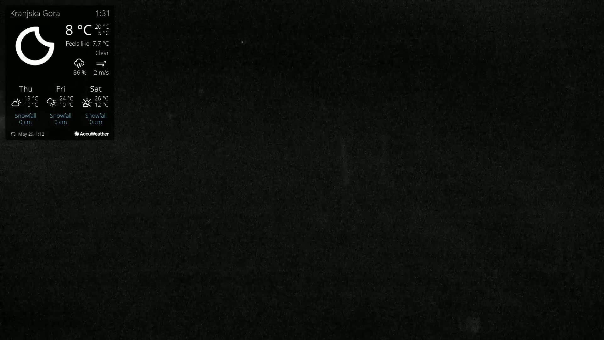 A mostly black image shows a weather forecast for Kranjska Gora indicating clear skies, a temperature of 8°C, and a wind speed of 2 m/s.