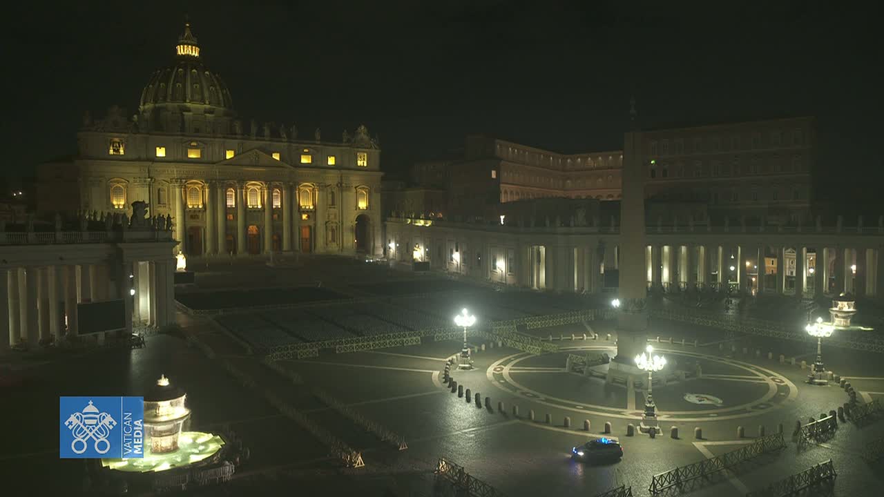 St. Peter's Basilica and St. Peter's Square are mostly empty at night, illuminated under dark skies.