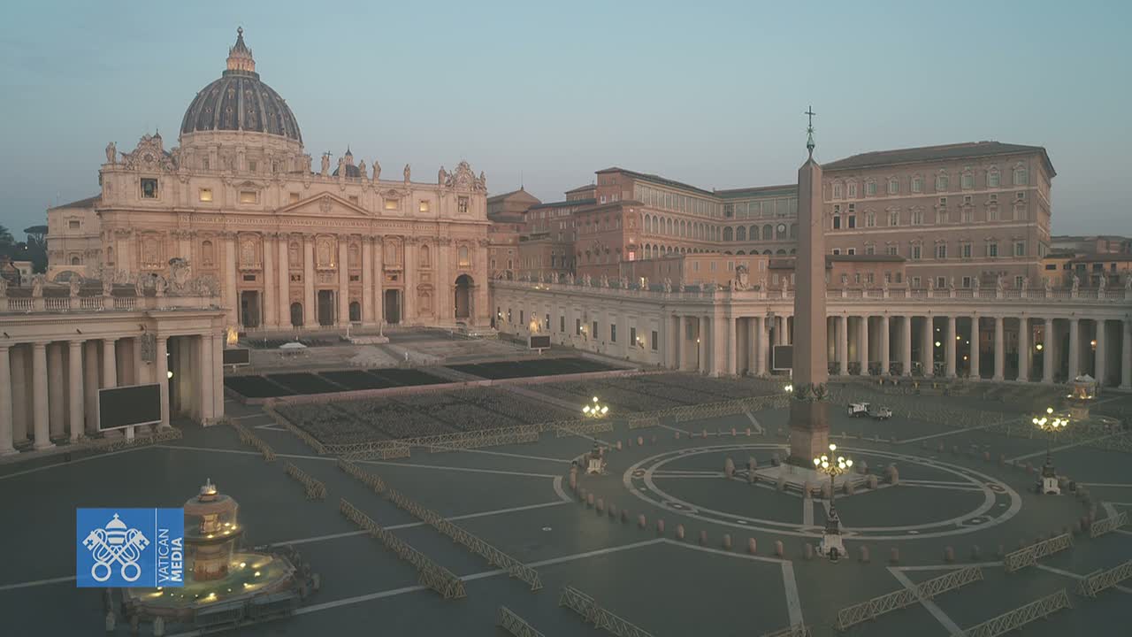 St. Peter's Basilica and Square are shown at dawn under a pale sky, with barriers and few people visible in the plaza.