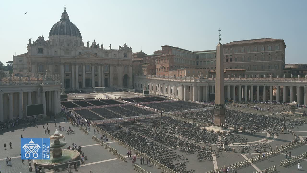 St. Peter's Basilica and Square in Vatican City are filled with many rows of empty chairs under a clear, sunny sky.