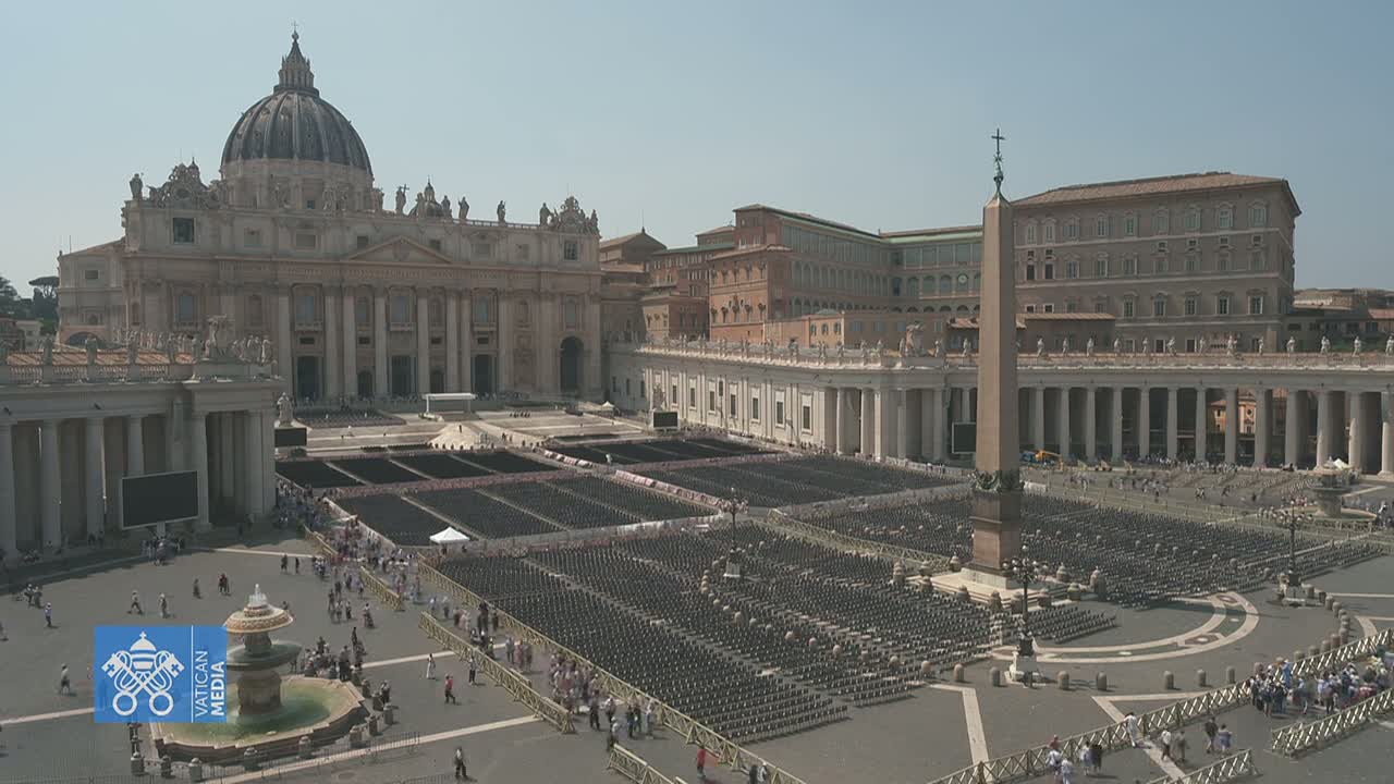 A large, mostly empty plaza in front of St. Peter's Basilica in Vatican City on a sunny day is filled with rows of empty chairs.