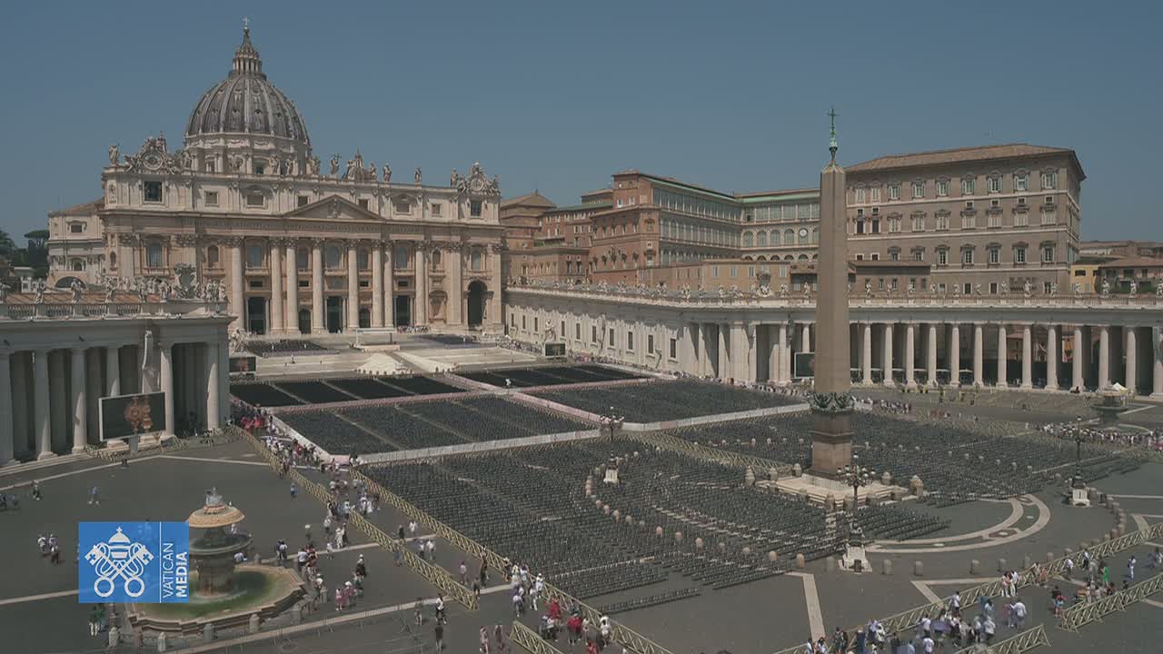 A large plaza filled with rows of empty chairs sits before St. Peter's Basilica on a sunny day.