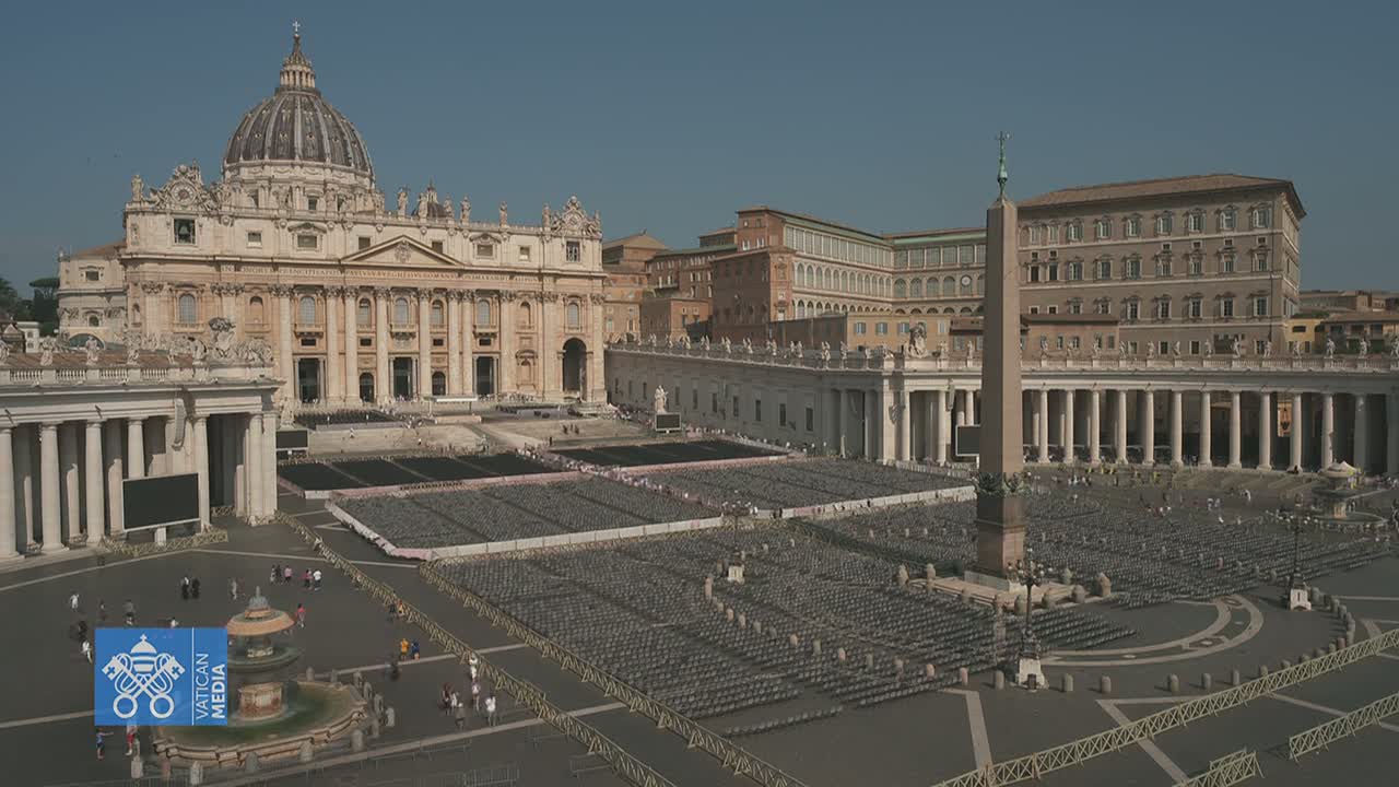 A large, mostly empty plaza in front of St. Peter's Basilica in Vatican City is filled with rows of chairs under a clear, sunny sky.