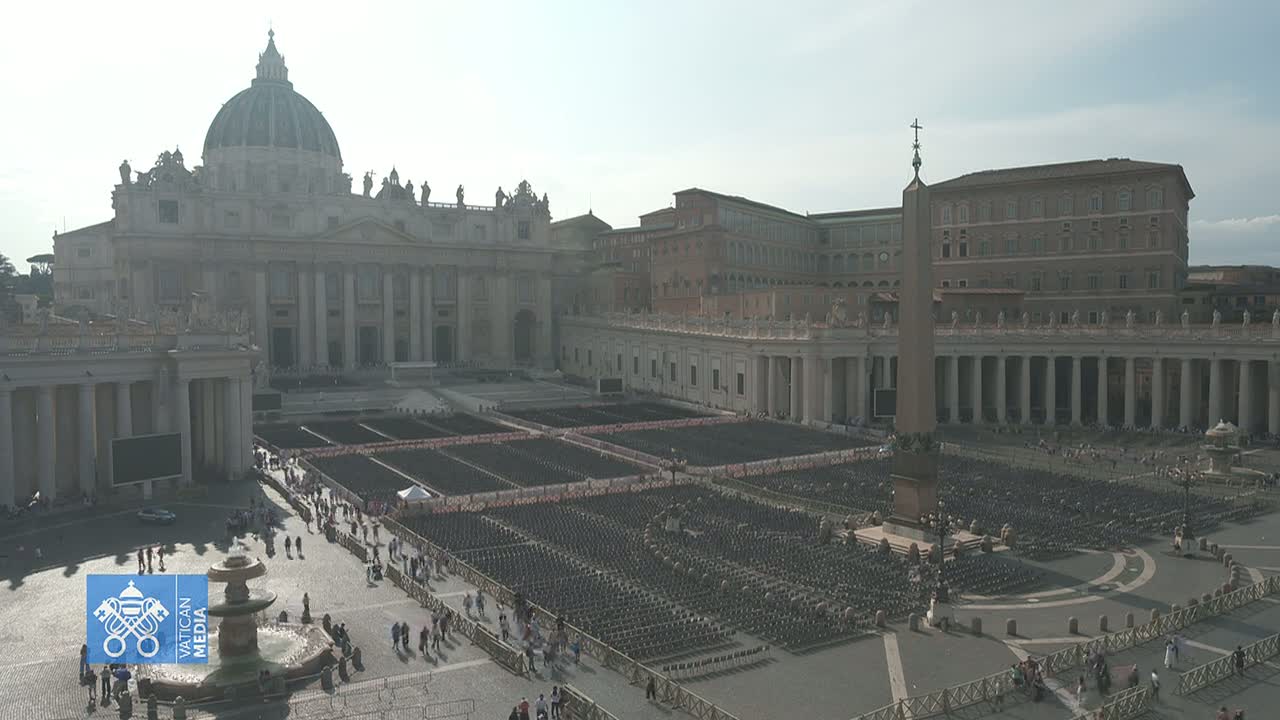 St. Peter's Square in Vatican City is filled with rows of empty chairs under a bright, sunny sky.