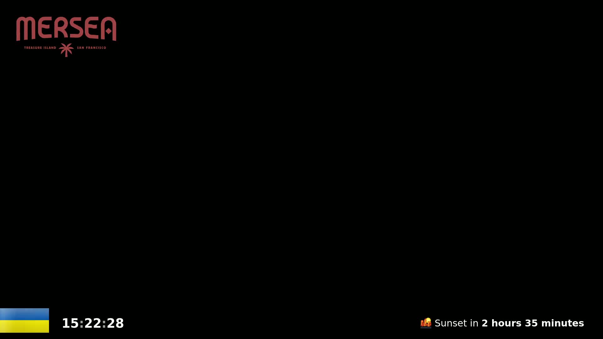 A black background displays a small Ukrainian flag, a digital clock showing 15:22:28, and an indication that sunset is in 2 hours and 35 minutes.